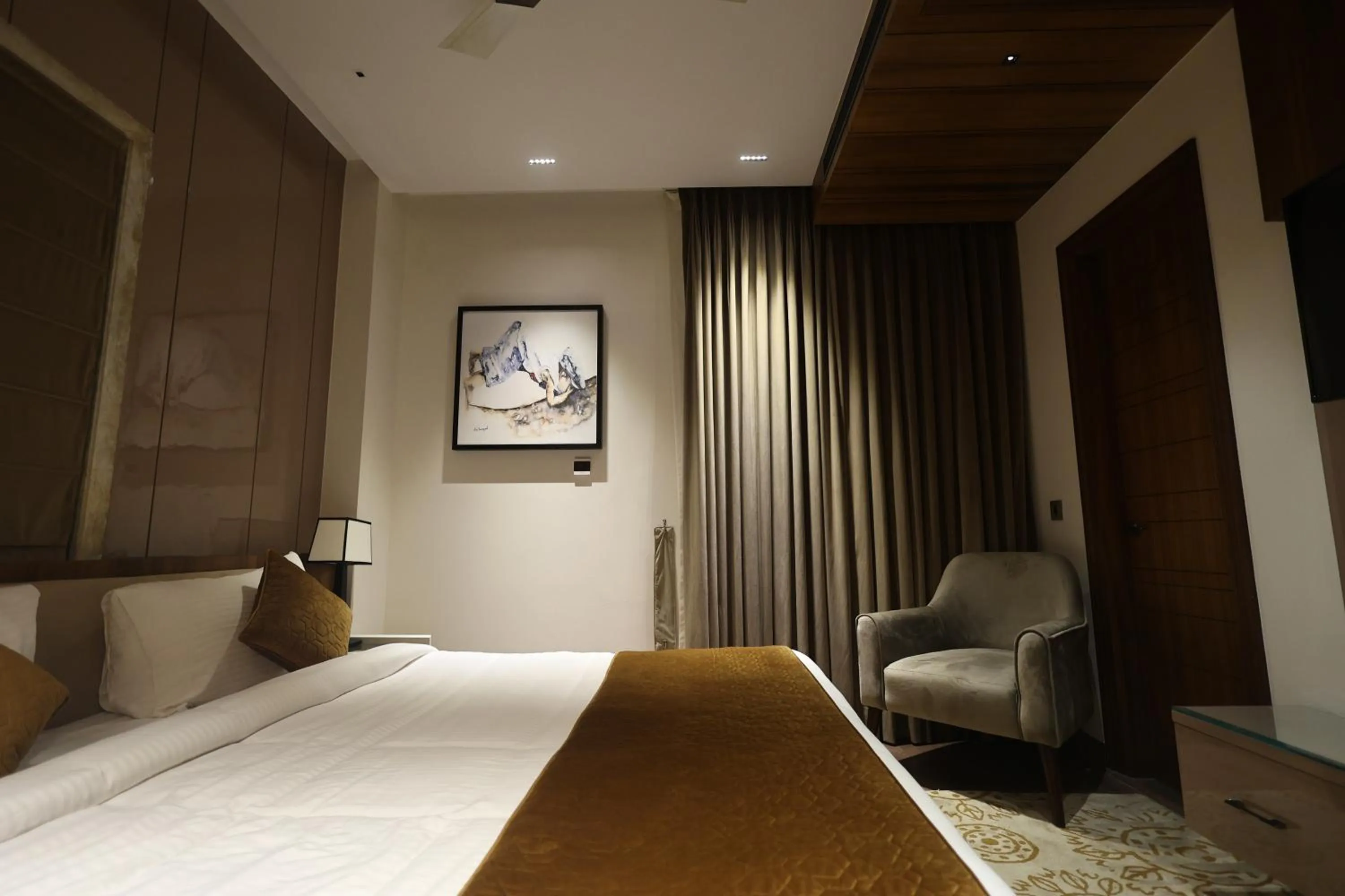Bed in The Ramayana Hotel, Ayodhya