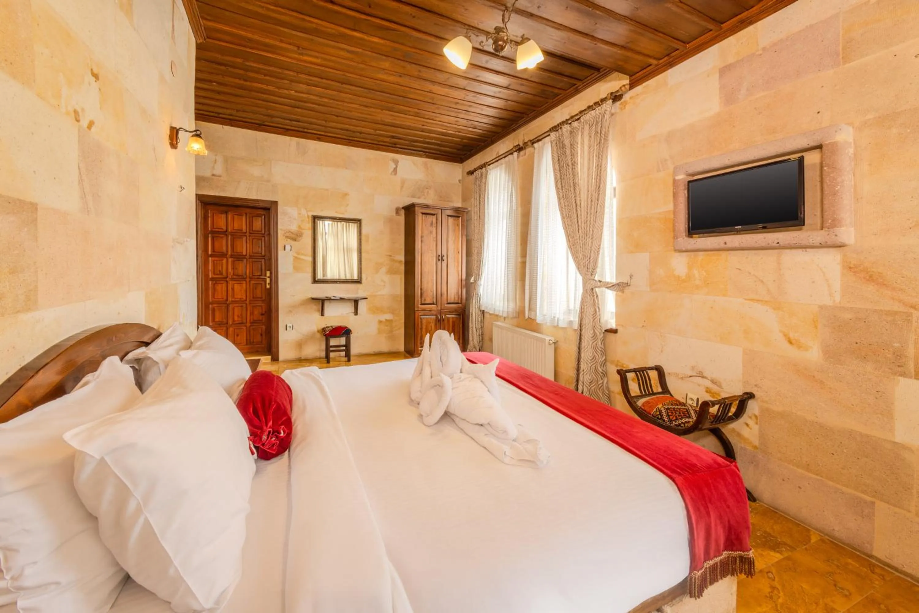 Bed in Akuzun Stone Hotel