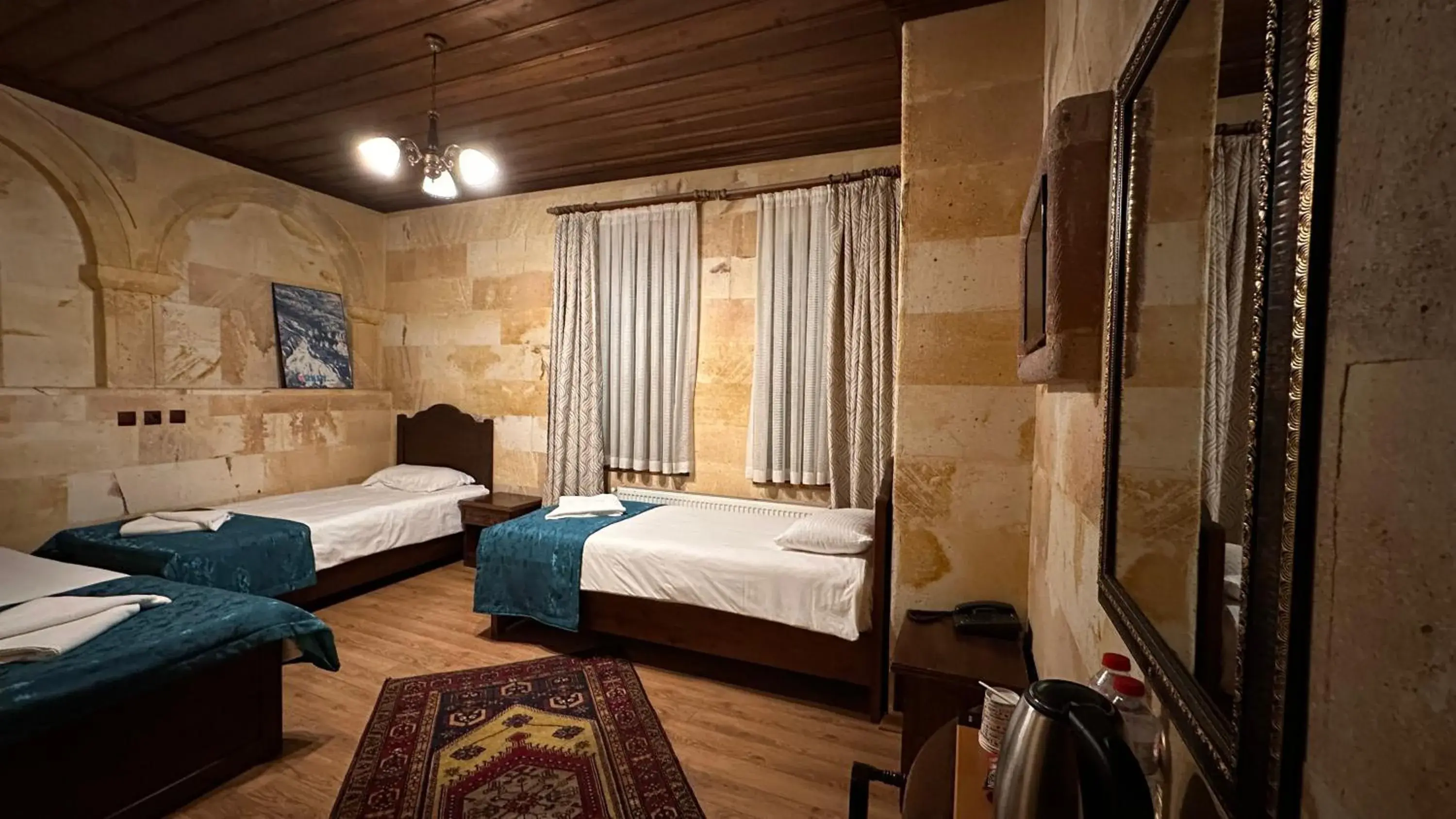 Superior Triple Room in Akuzun Stone Hotel Superior Triple Room in Akuzun Stone Hotel