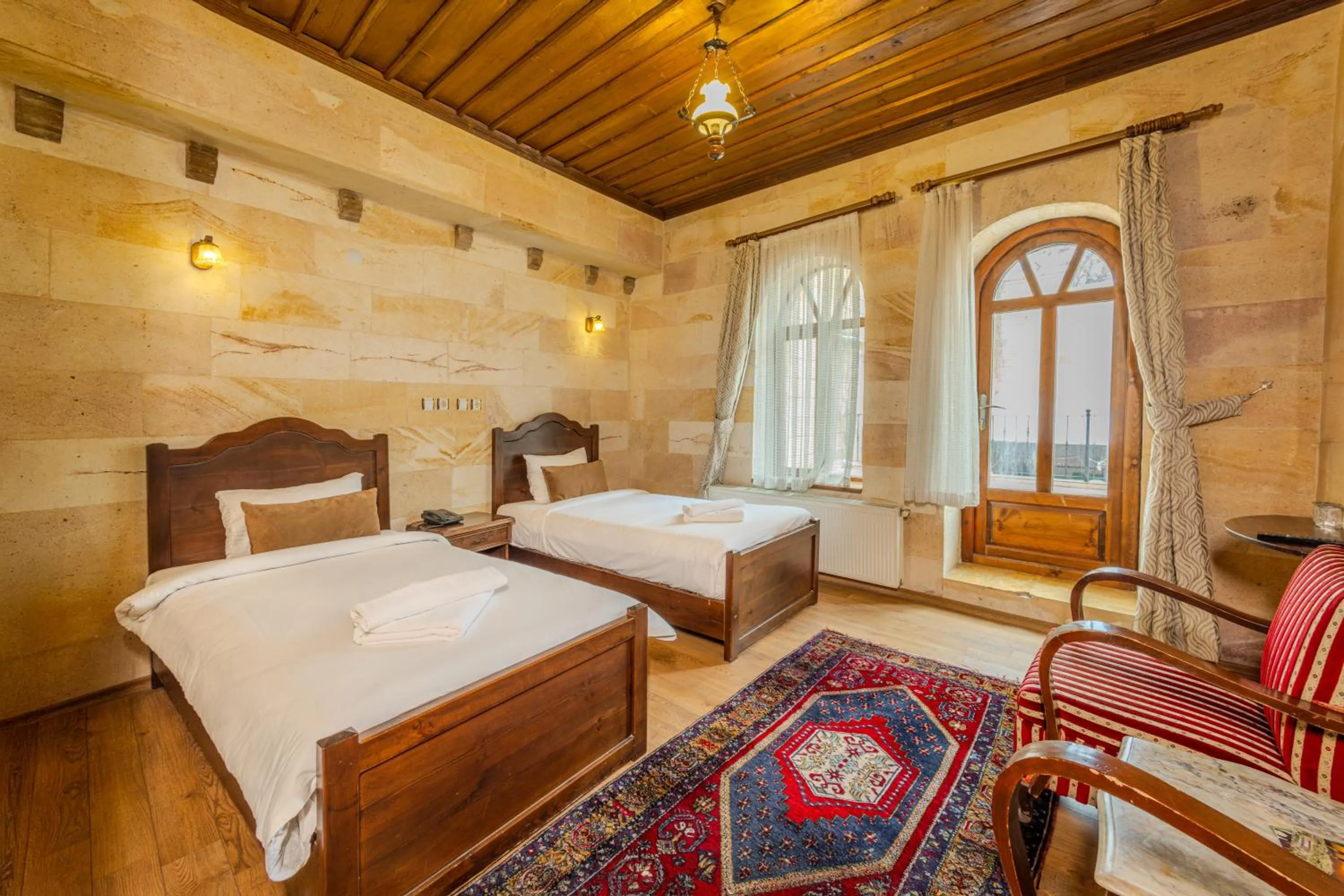 Bed in Akuzun Stone Hotel