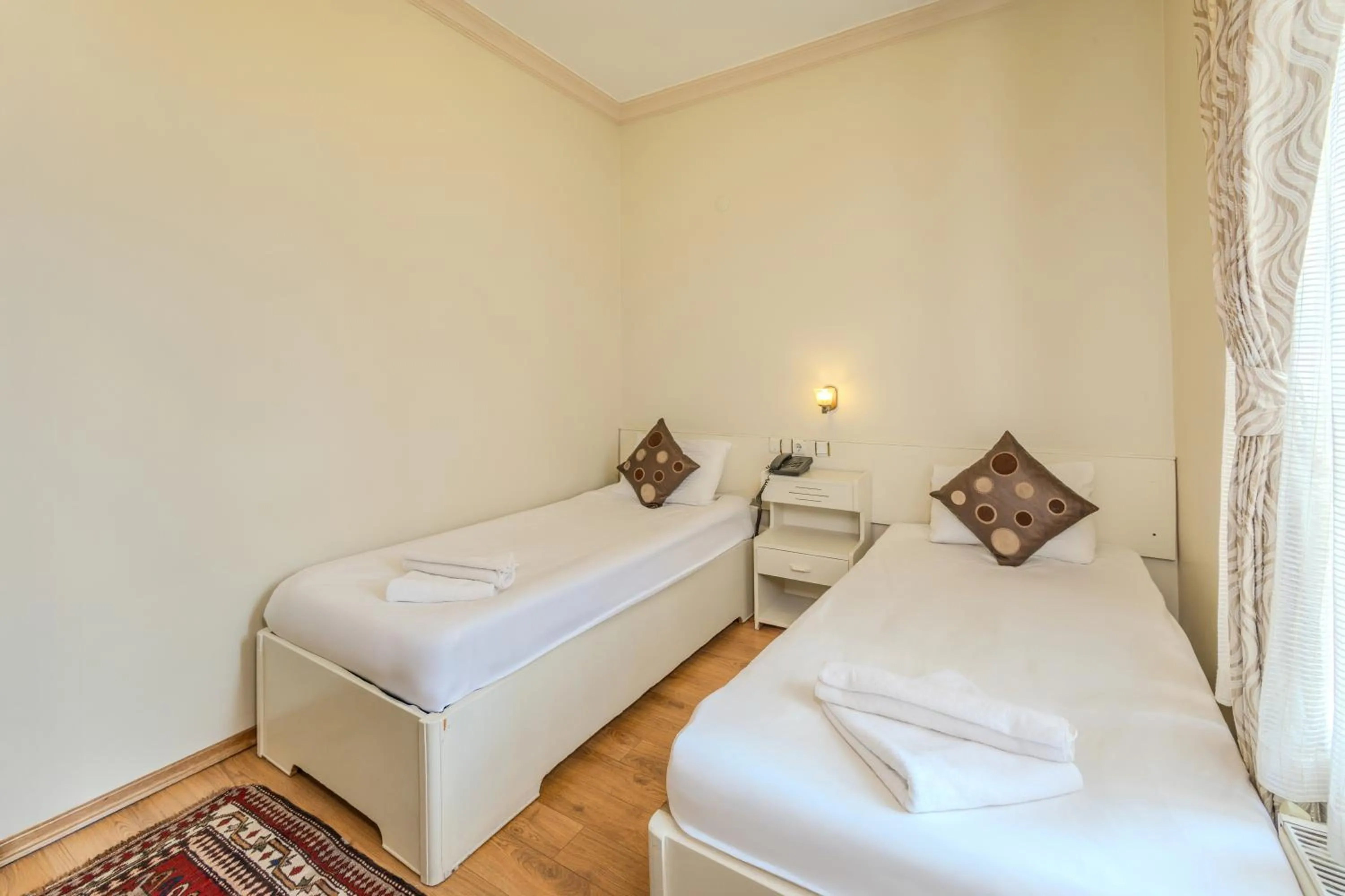 Bed in Akuzun Stone Hotel