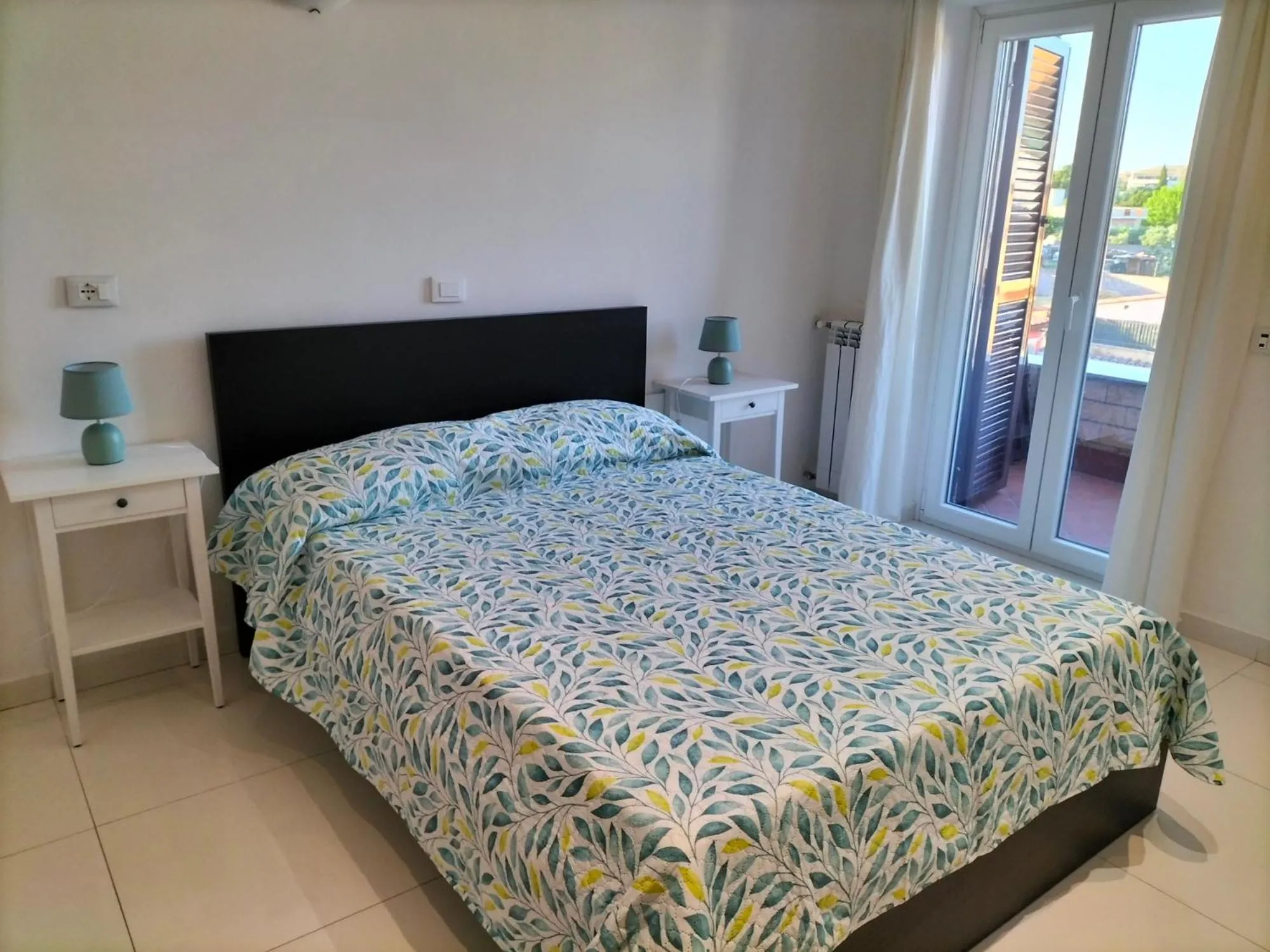 Bed in THE HOUSE FIERA di ROMA AEROPORTO FIUMICINO