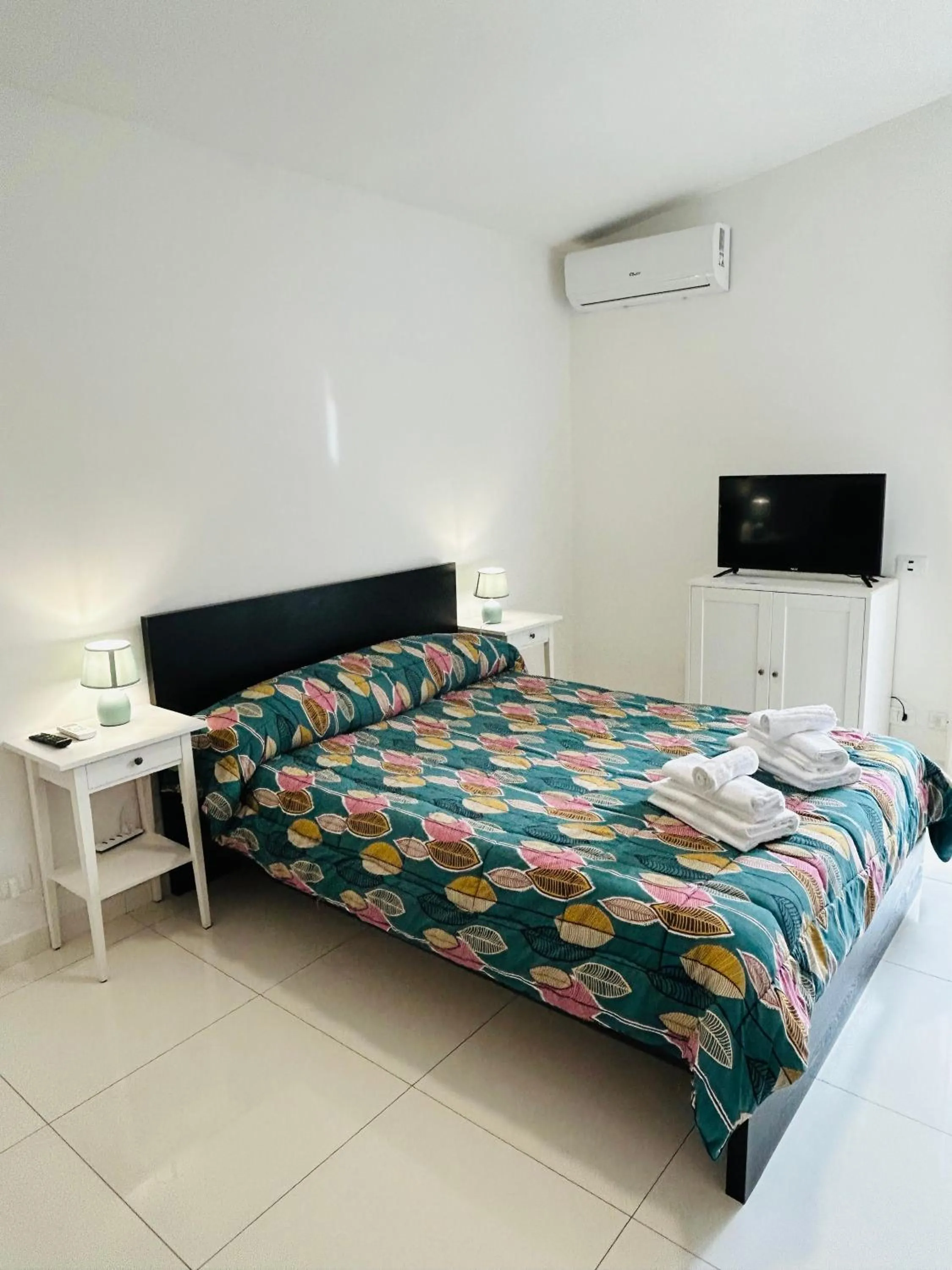 Bed in THE HOUSE FIERA di ROMA AEROPORTO FIUMICINO