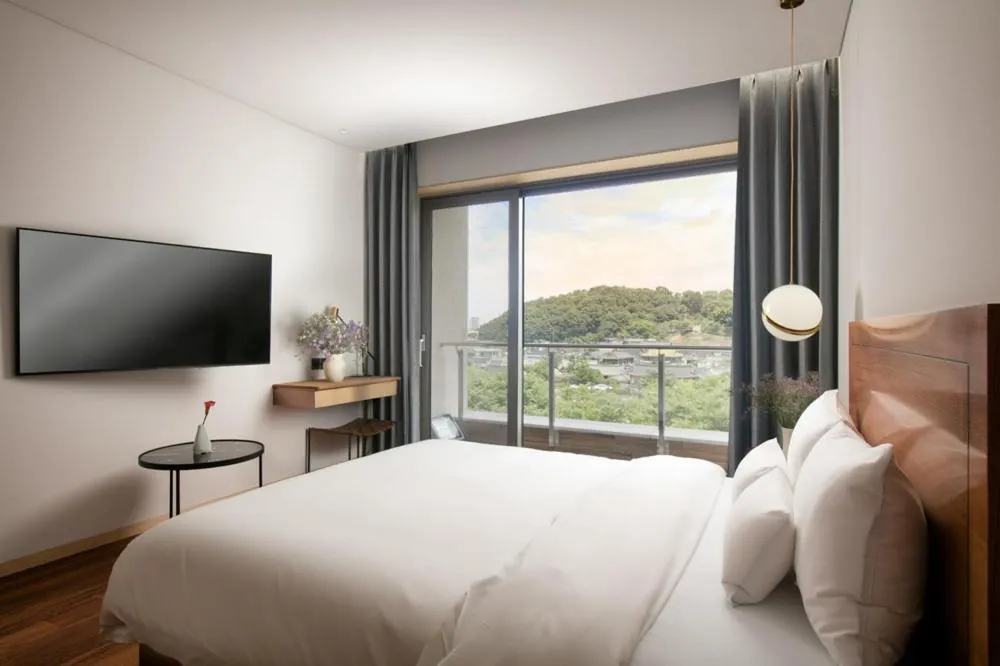 Photo of the whole room, Bed in Daon Hotel