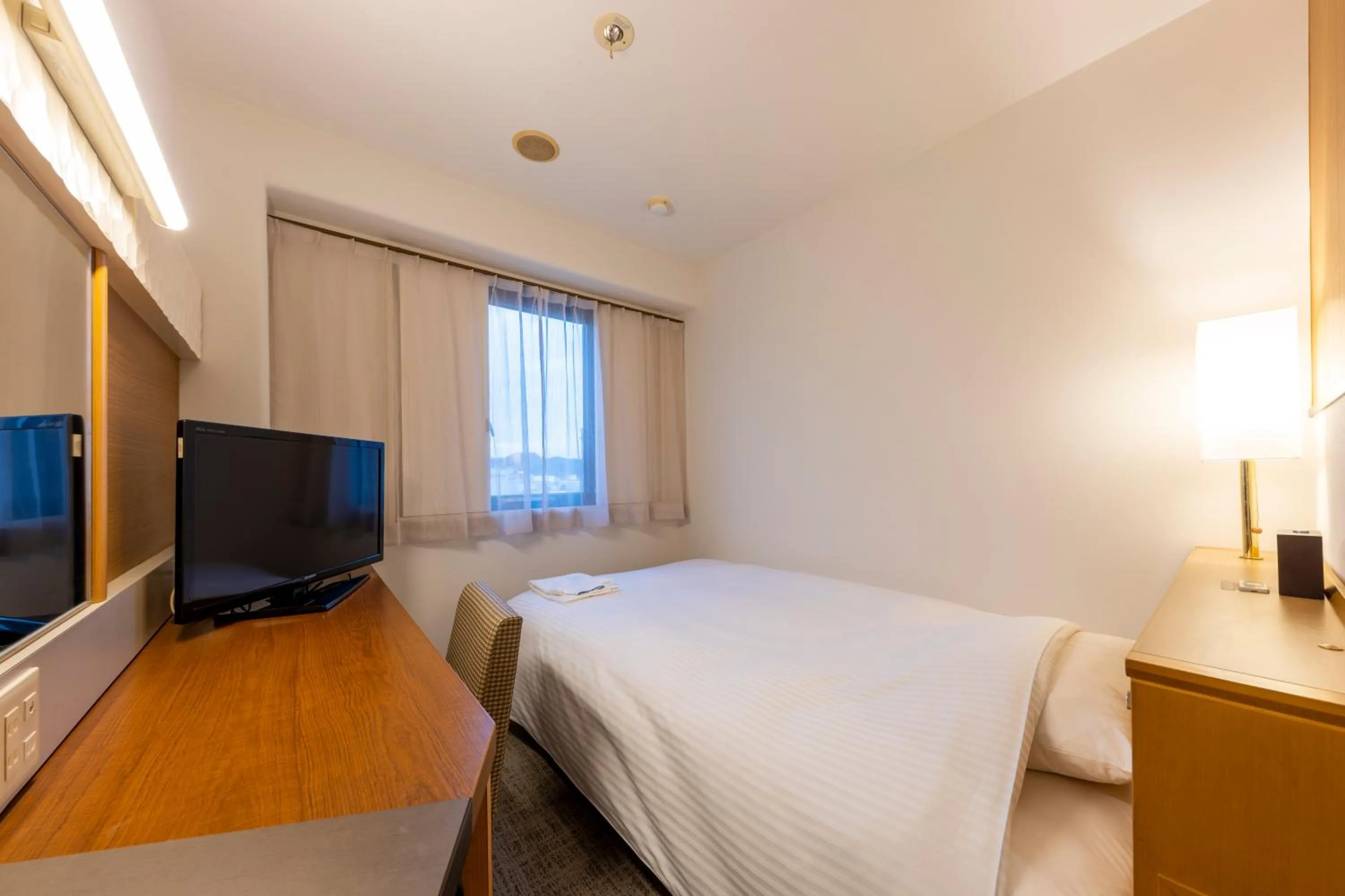 Photo of the whole room, Bed in JR CLEMENT INN HIMEJI