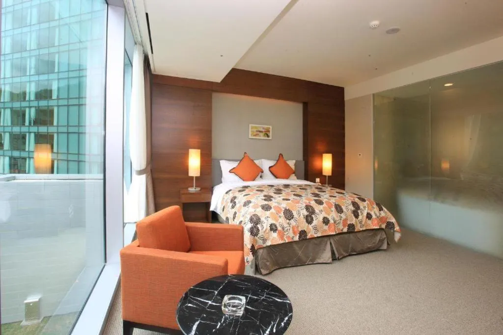 Bed in High1 Grand Hotel Convention Tower