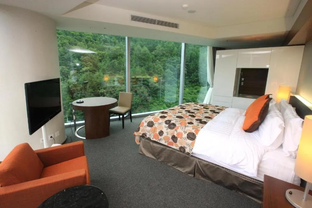 Bed in High1 Grand Hotel Convention Tower