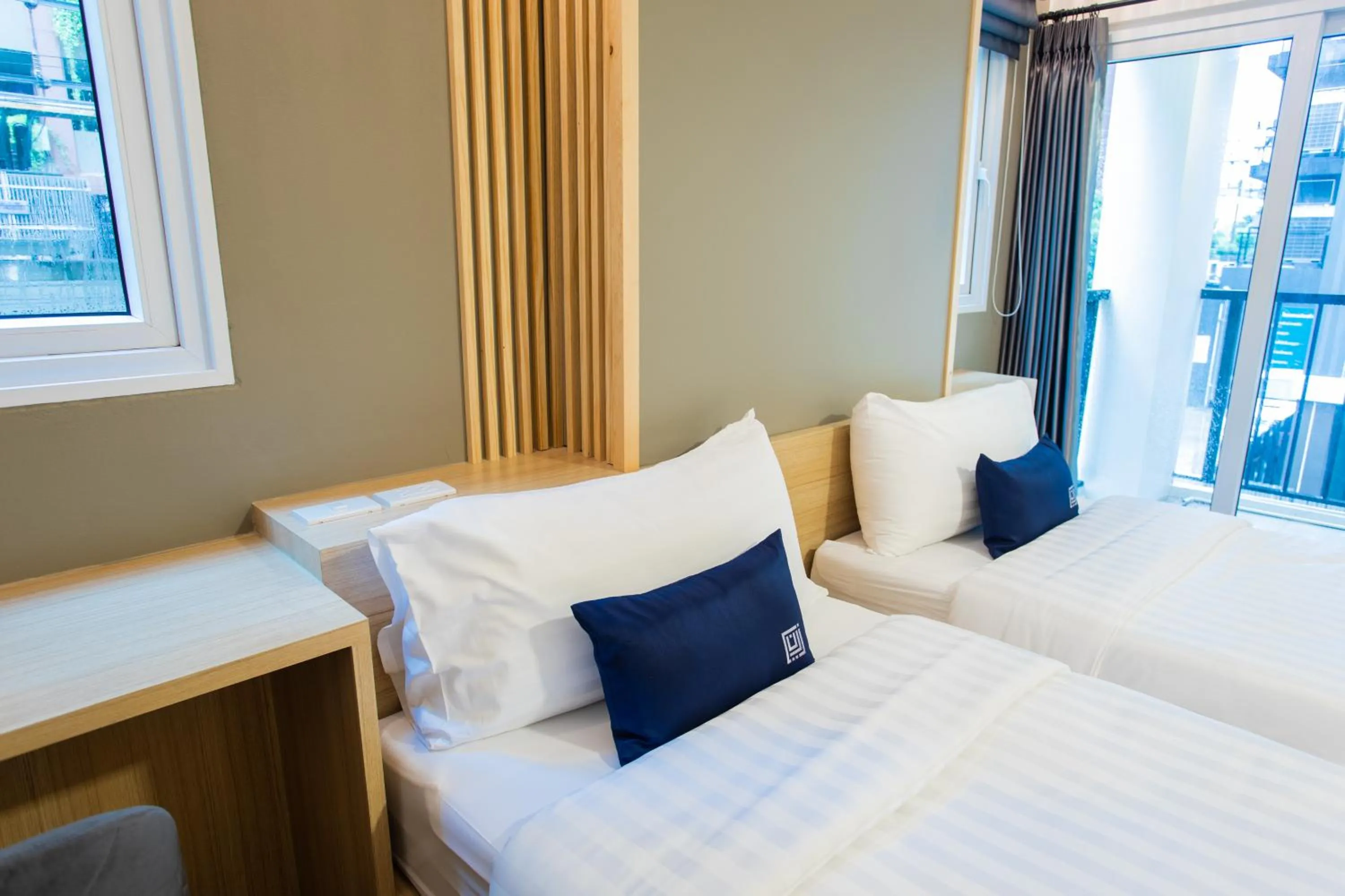 Bed in Zayn Express & Suites