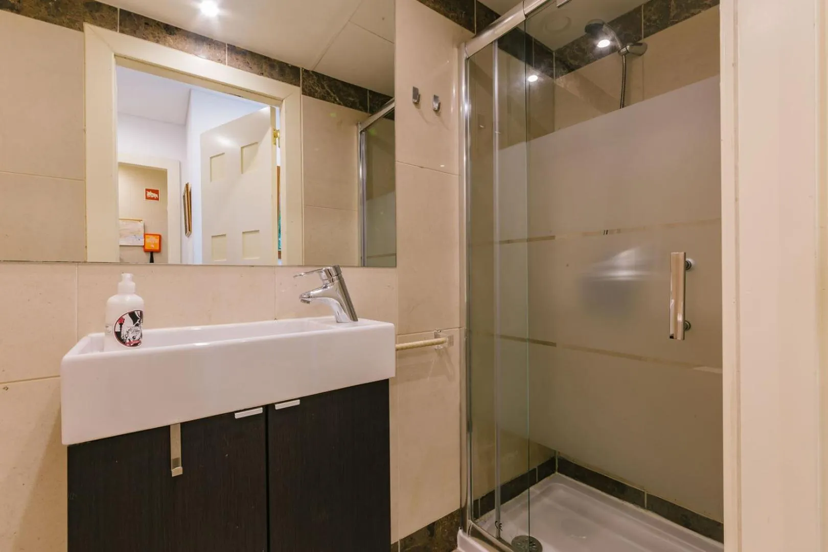 Shower in Rent4Rest Estoril Beachfront Apartments