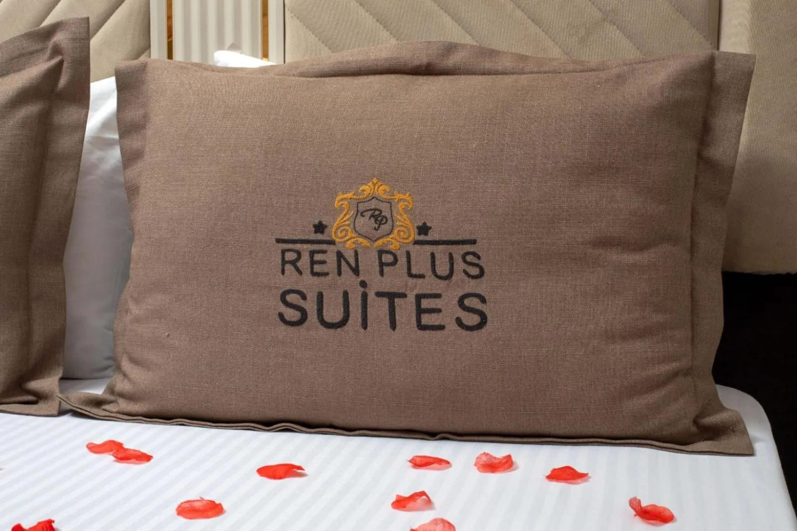 Property logo or sign, Bed in REN PLUS SUITES
