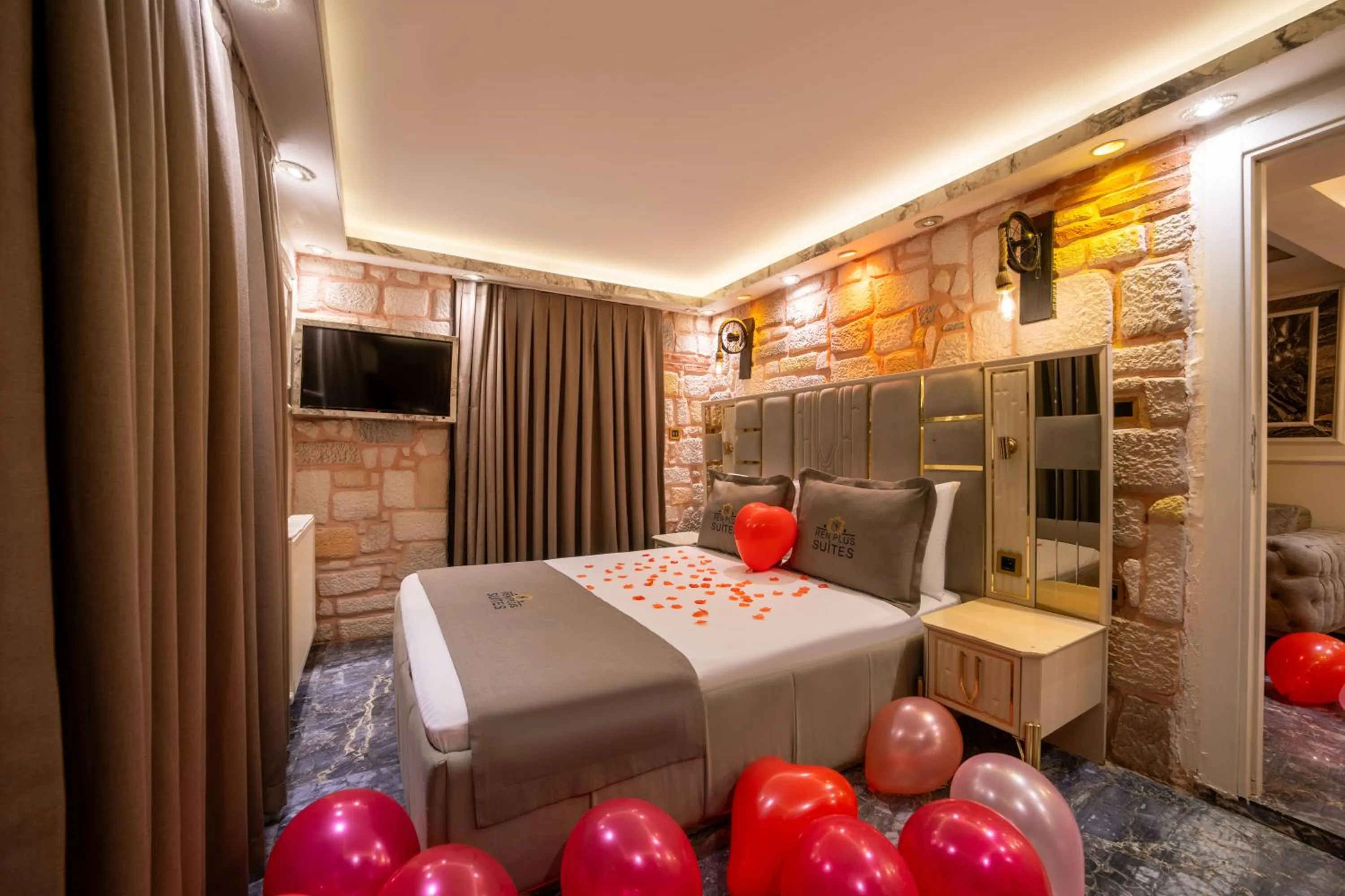 Photo of the whole room, Bed in REN PLUS SUITES