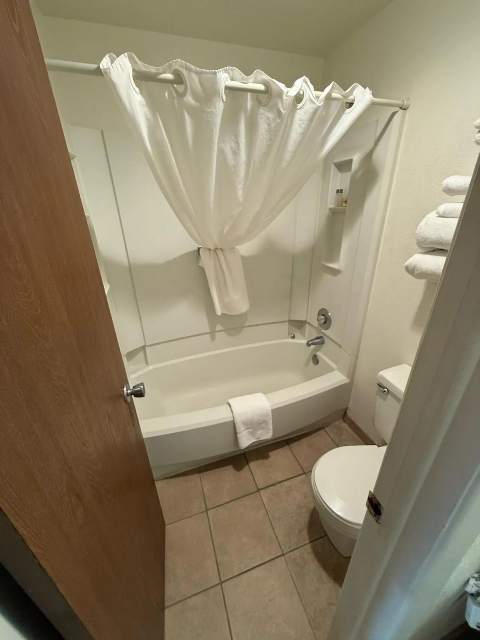 Toilet in Richland Inn and Suites