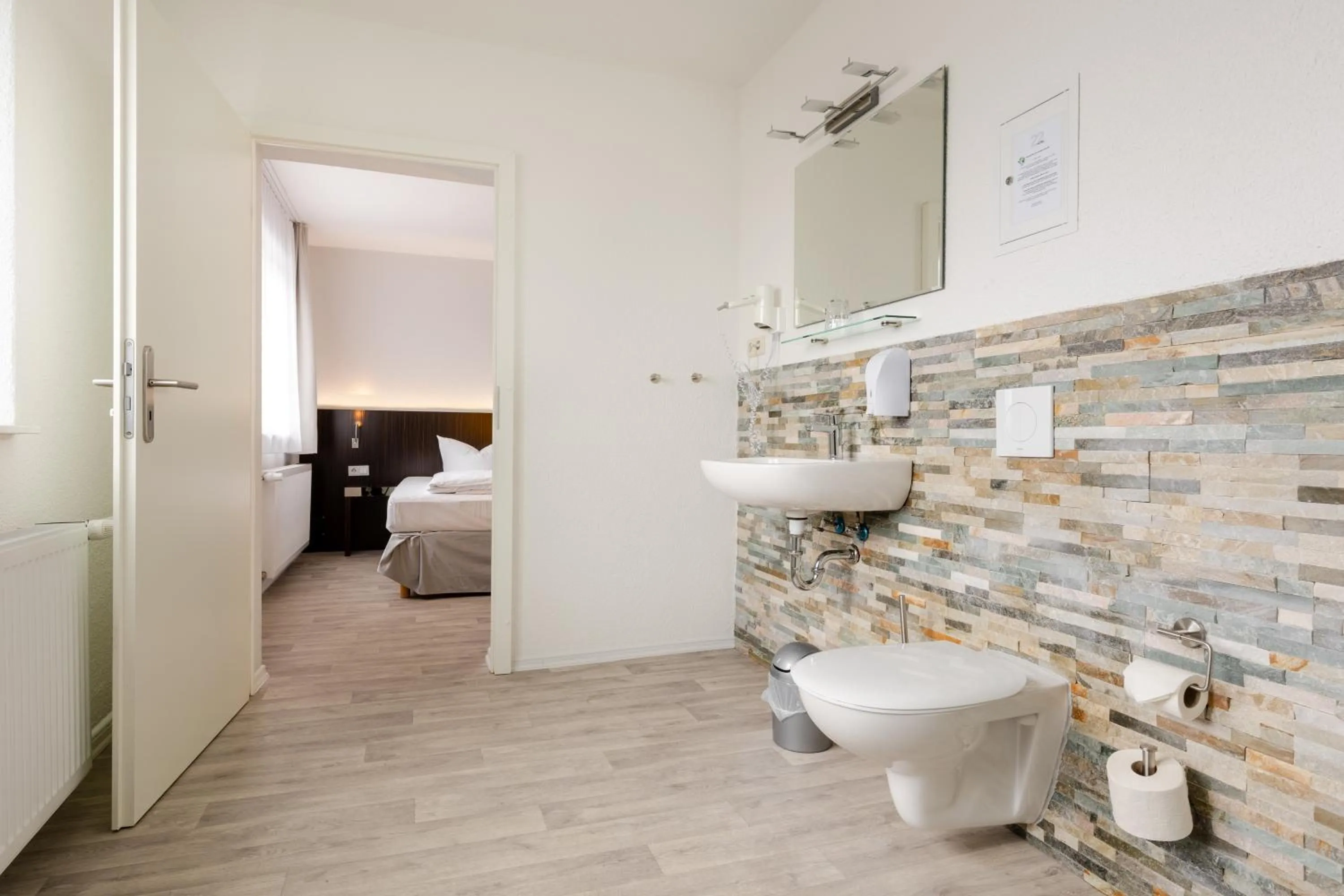 Toilet, Bed in Hotel 22