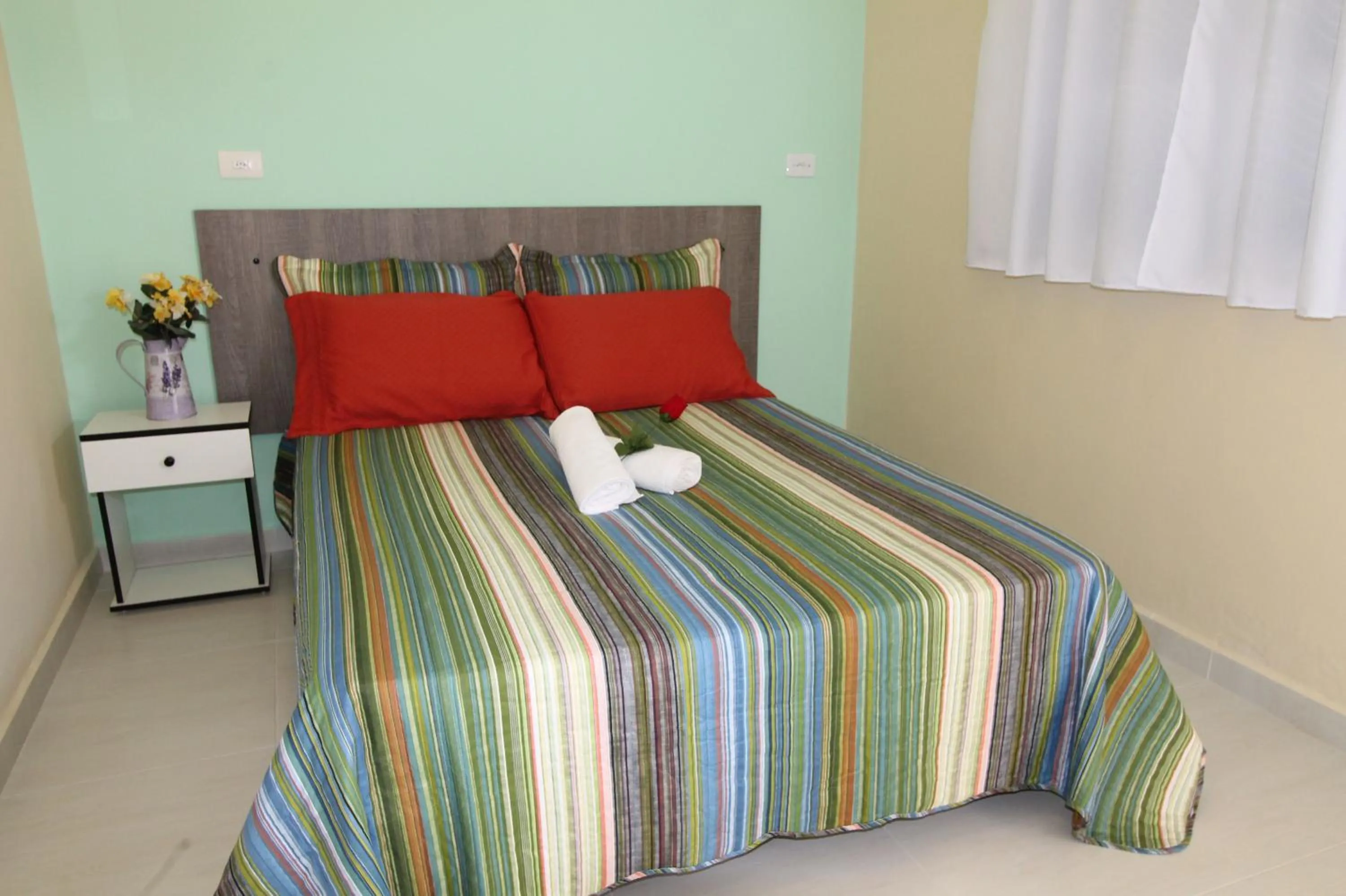 Photo of the whole room, Bed in Pousada Porto Paraiso, o seu Paraíso Escondido no Guarujá