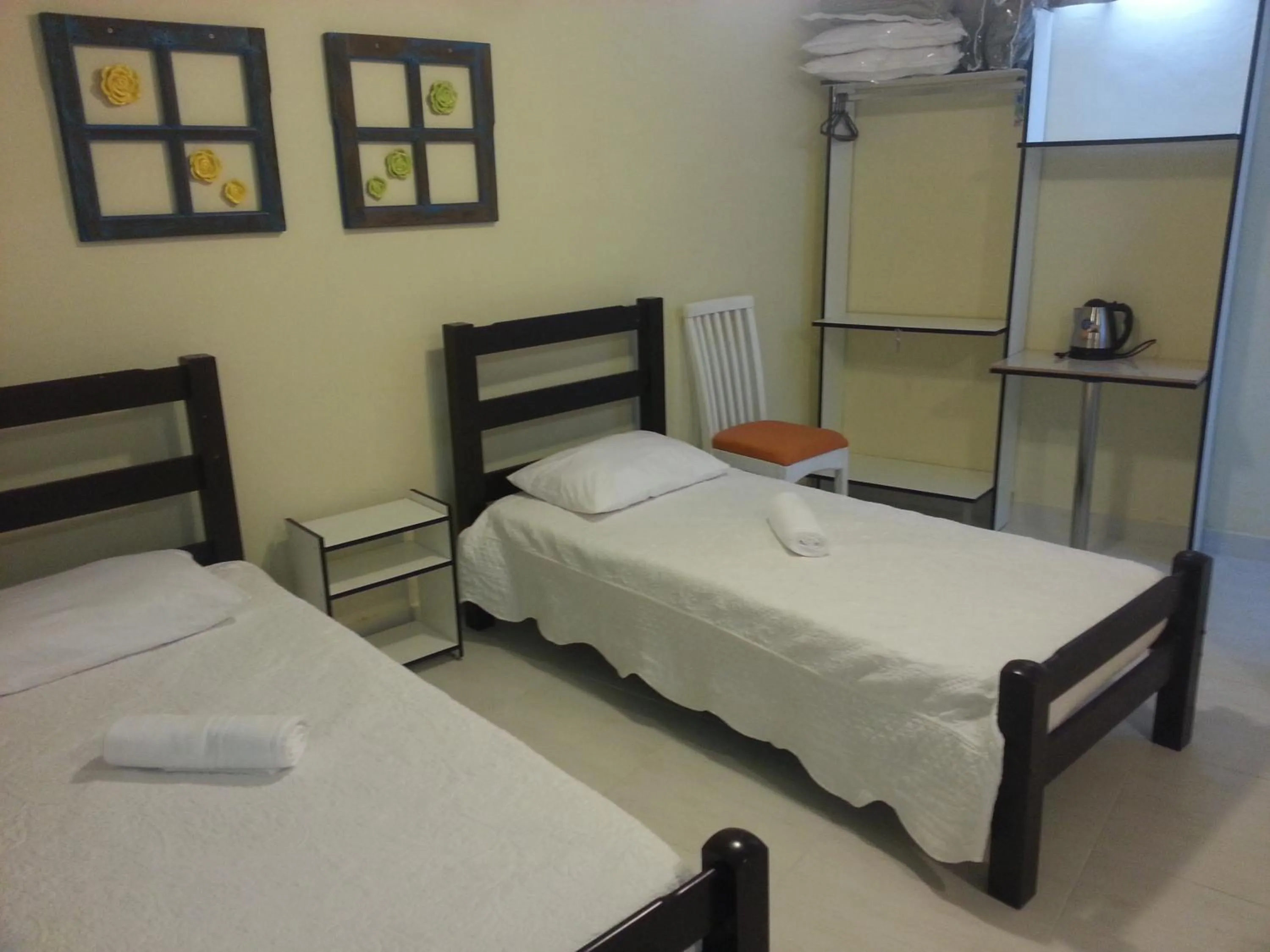 Photo of the whole room, Bed in Pousada Porto Paraiso, o seu Paraíso Escondido no Guarujá