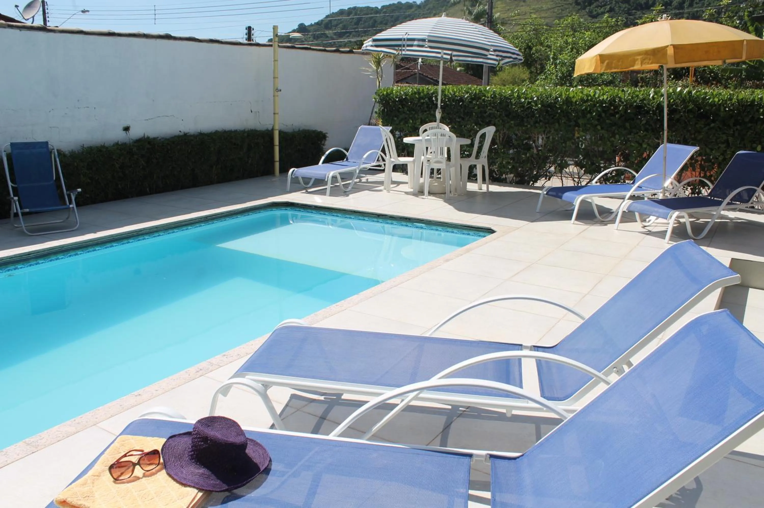 Swimming pool in Pousada Porto Paraiso, o seu Paraíso Escondido no Guarujá