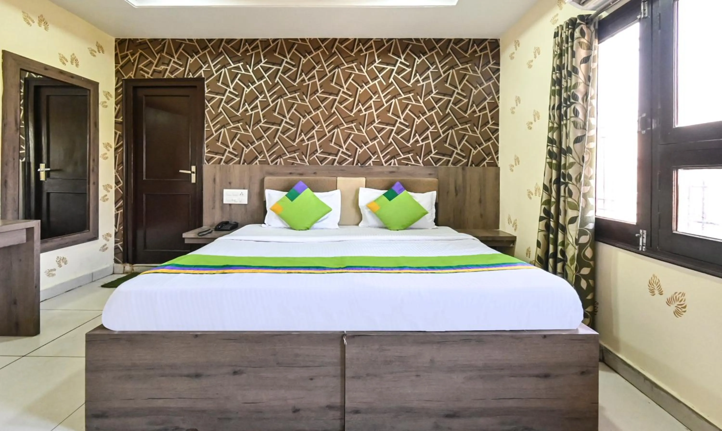 Bedroom, Bed in Treebo Siddharth