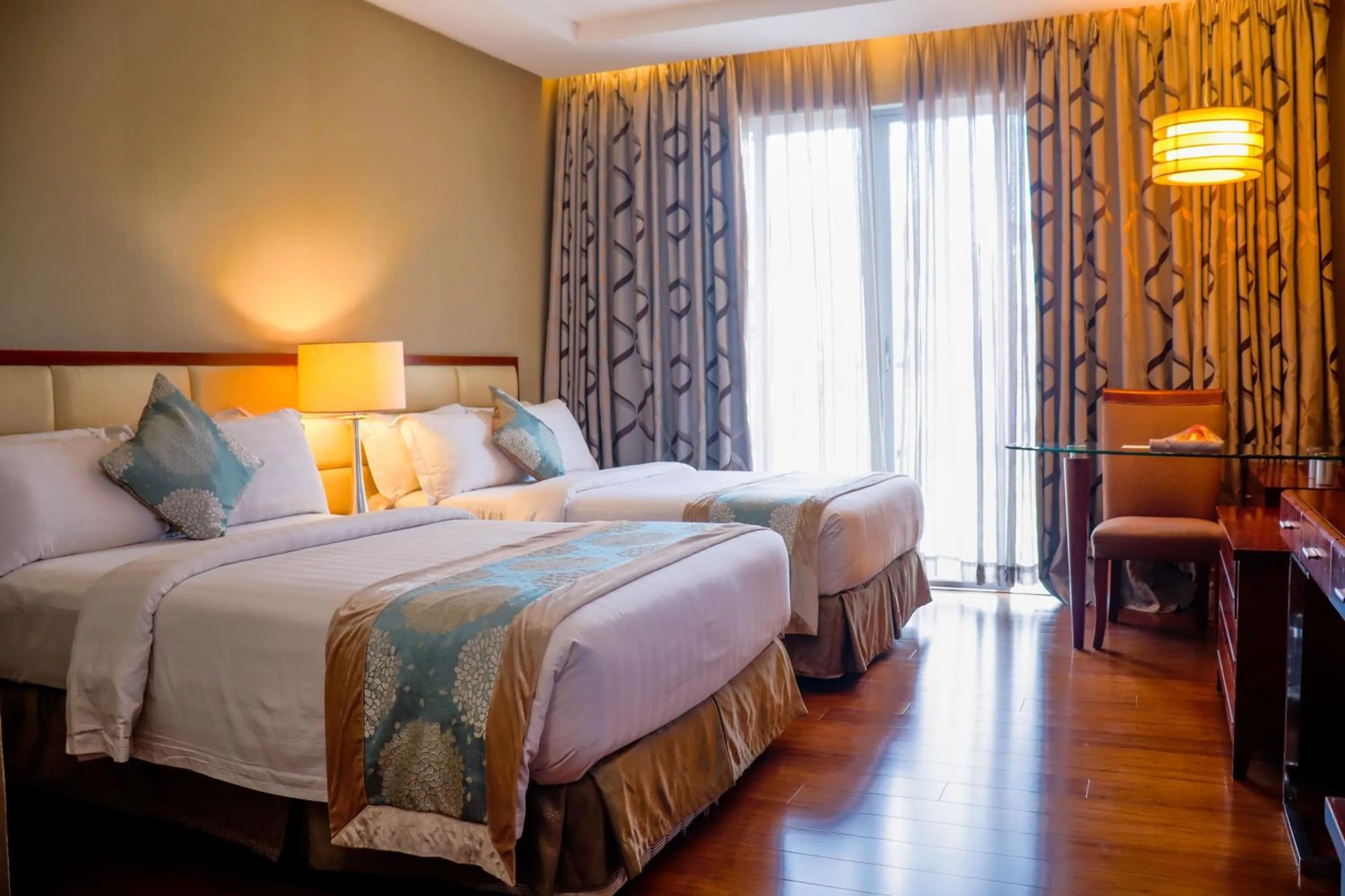 Bed in The Avenue Plaza Hotel