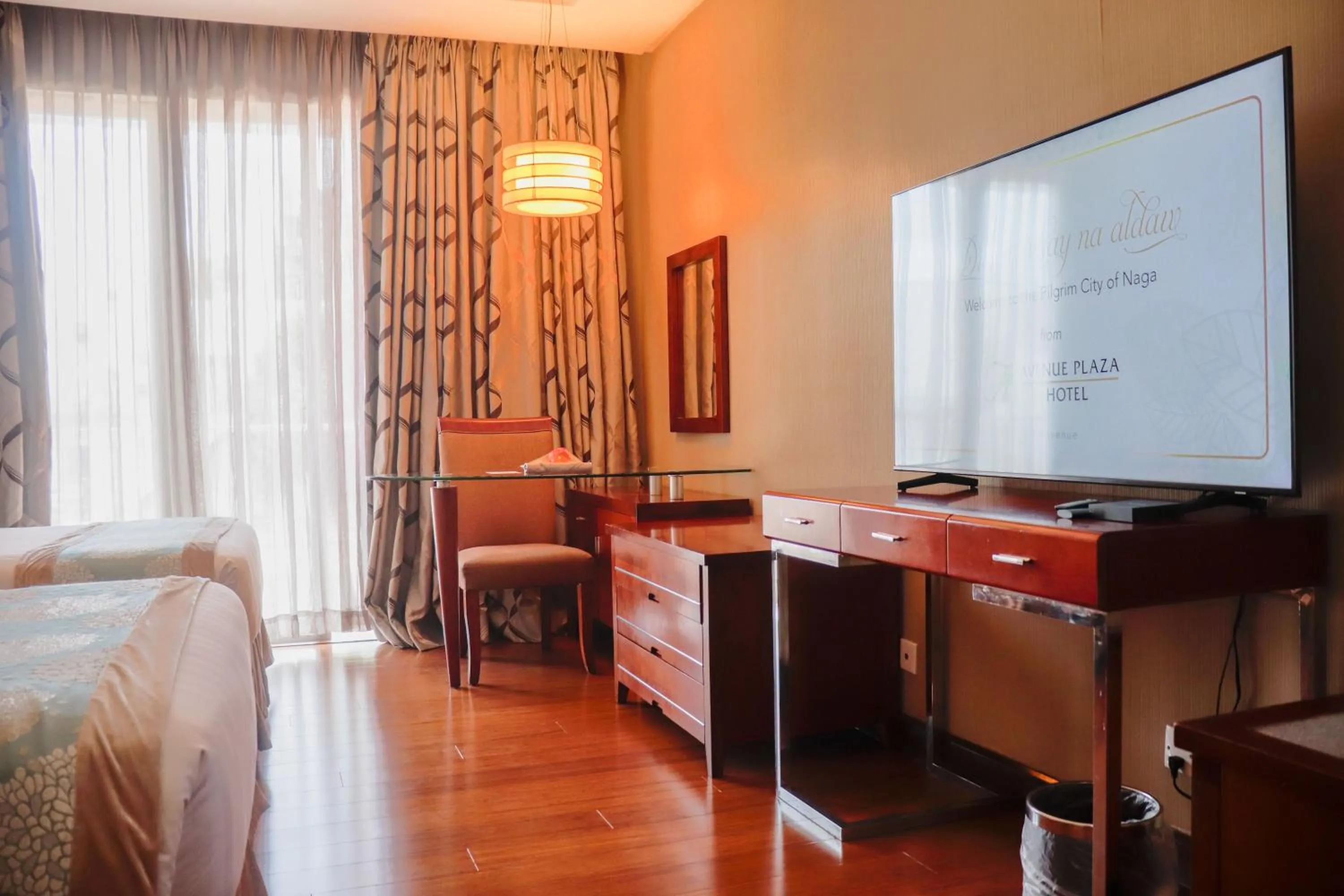 Bed in The Avenue Plaza Hotel