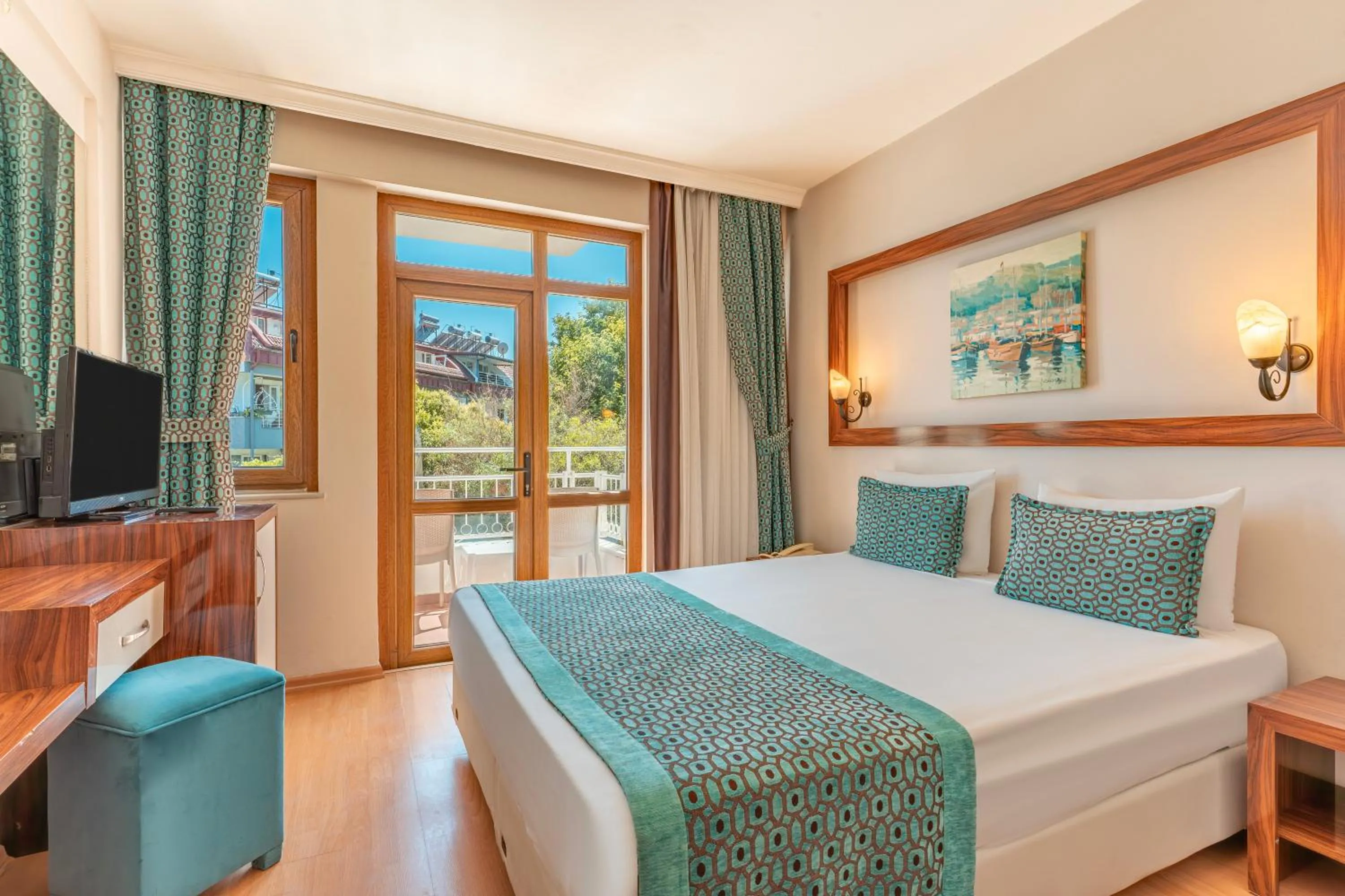 Bed in Tu Casa Gelidonya Hotel