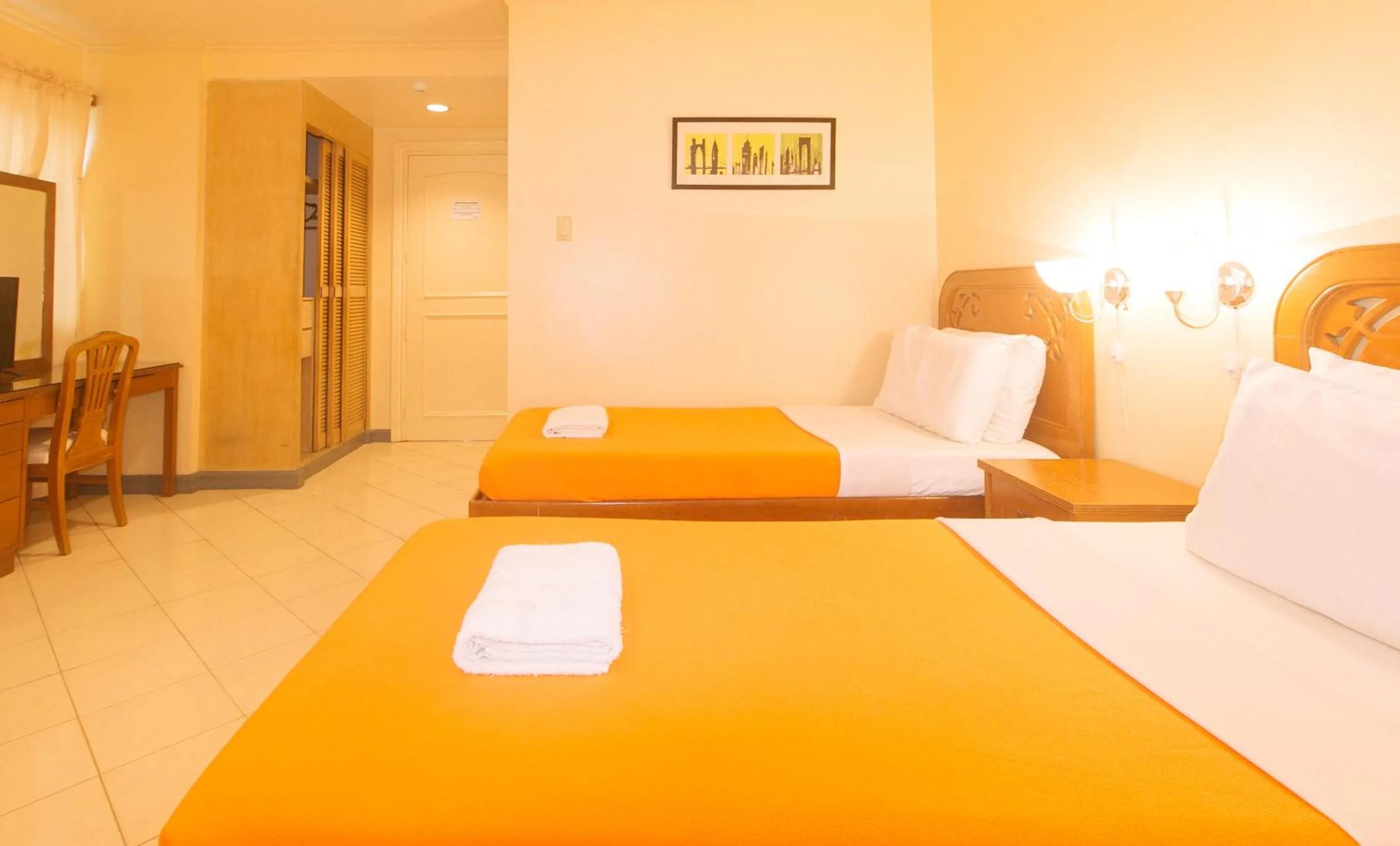 Bedroom, Bed in Royal Am Rei Hotel by RedDoorz