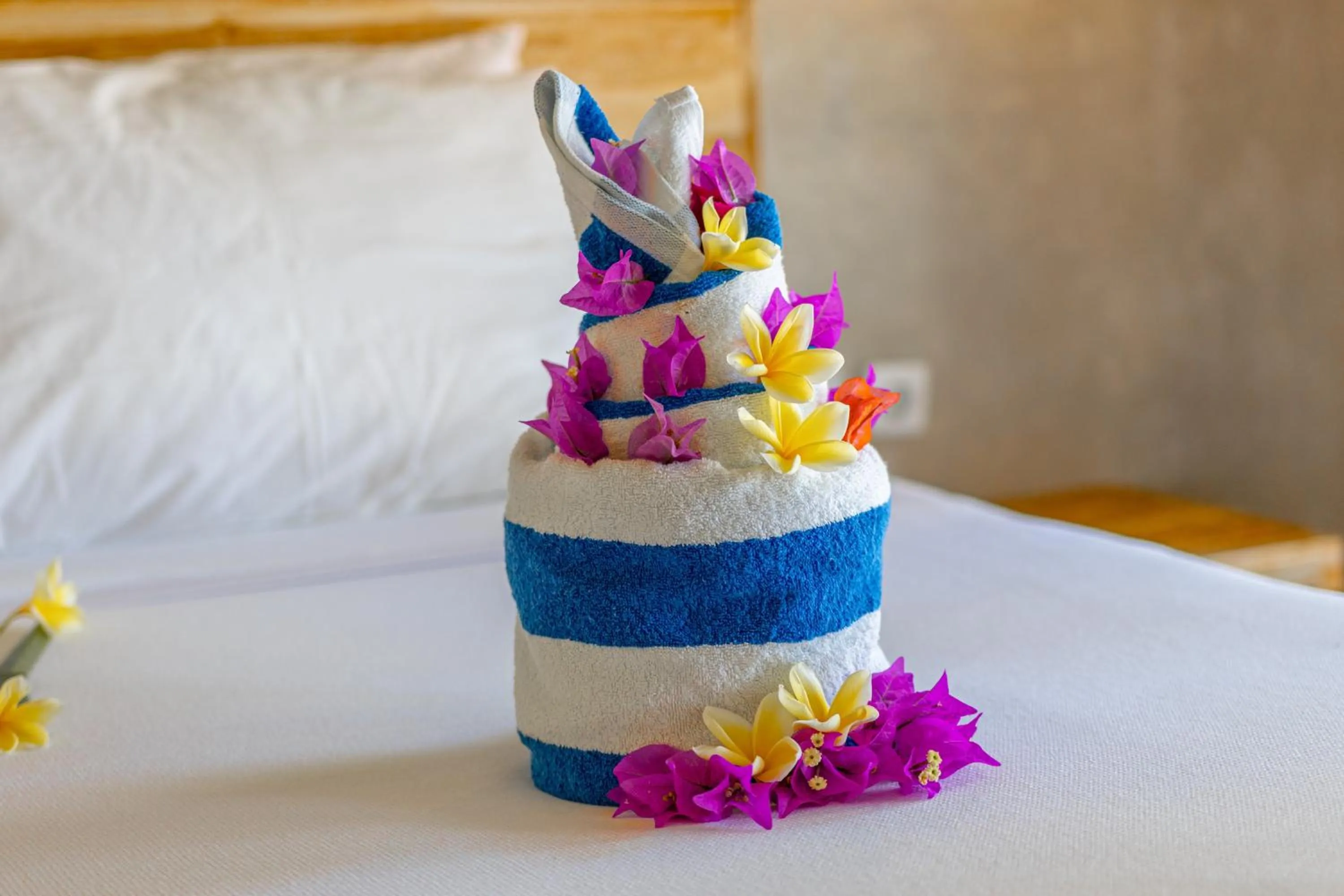 Bed in Golden Garuda Cottages