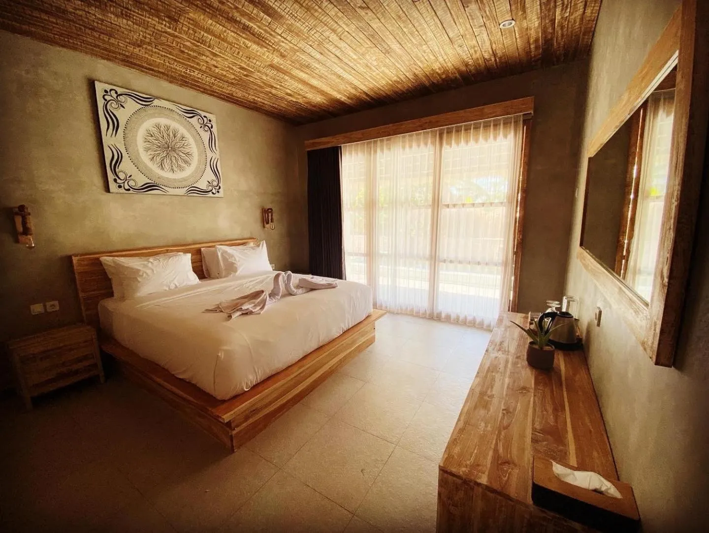 Bed in Golden Garuda Cottages