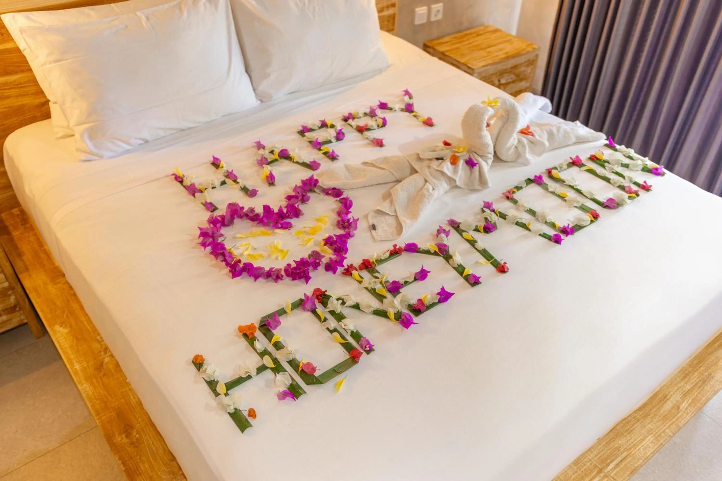 Bed in Golden Garuda Cottages