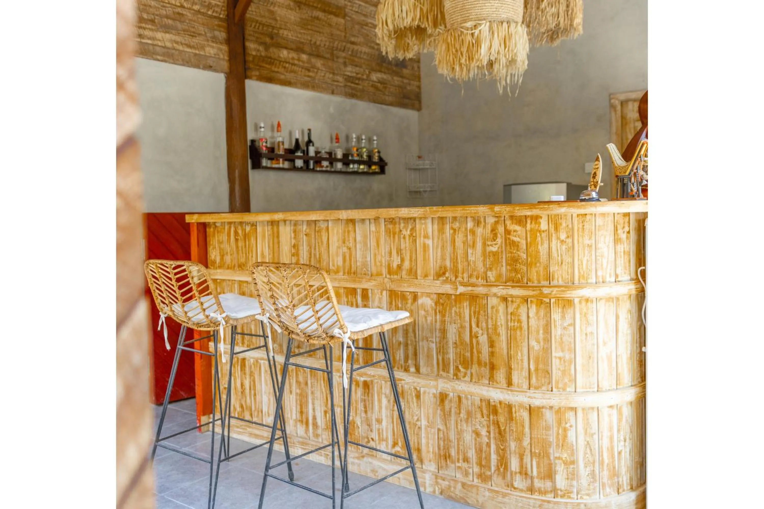 Lounge or bar in Golden Garuda Cottages