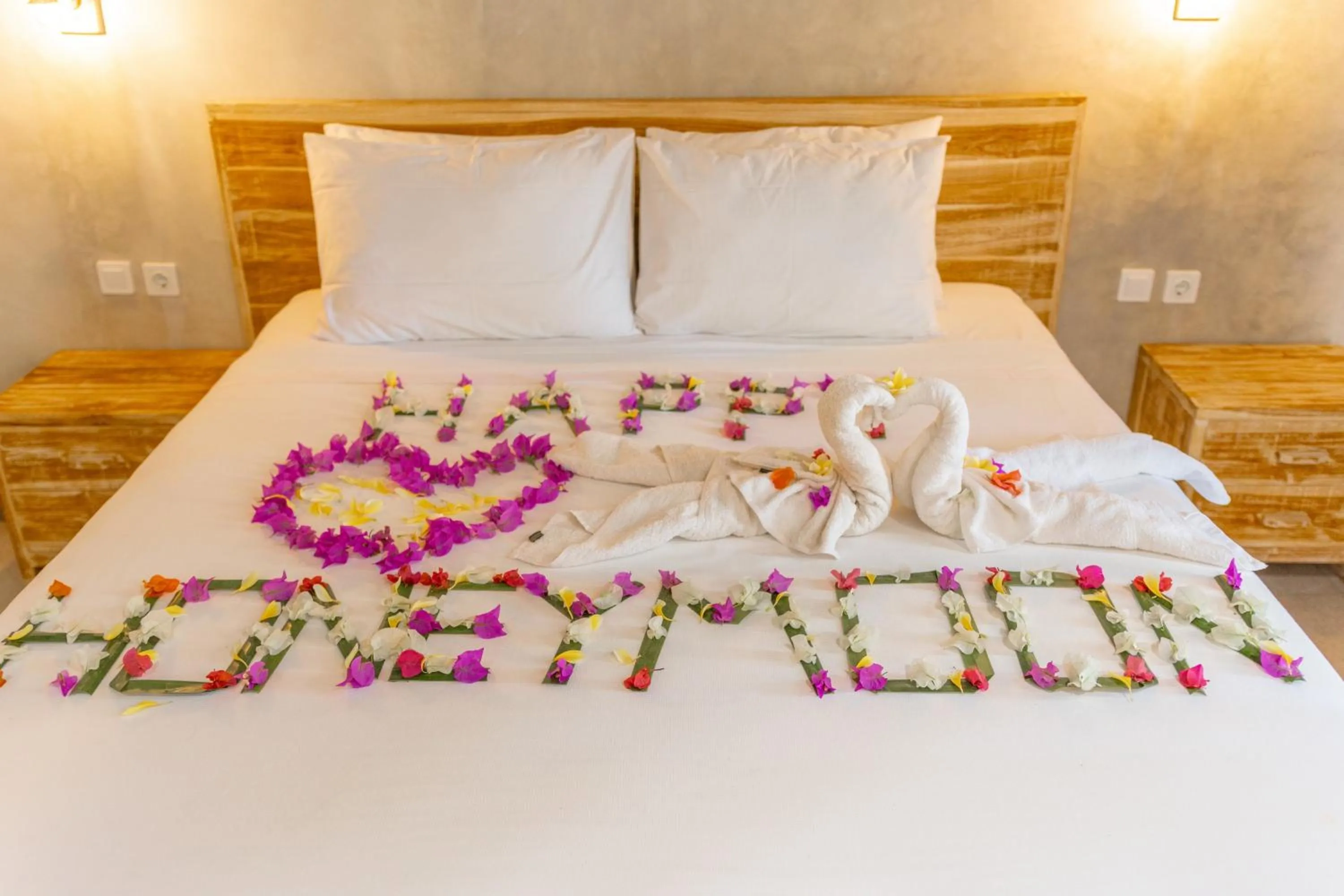 Bed in Golden Garuda Cottages