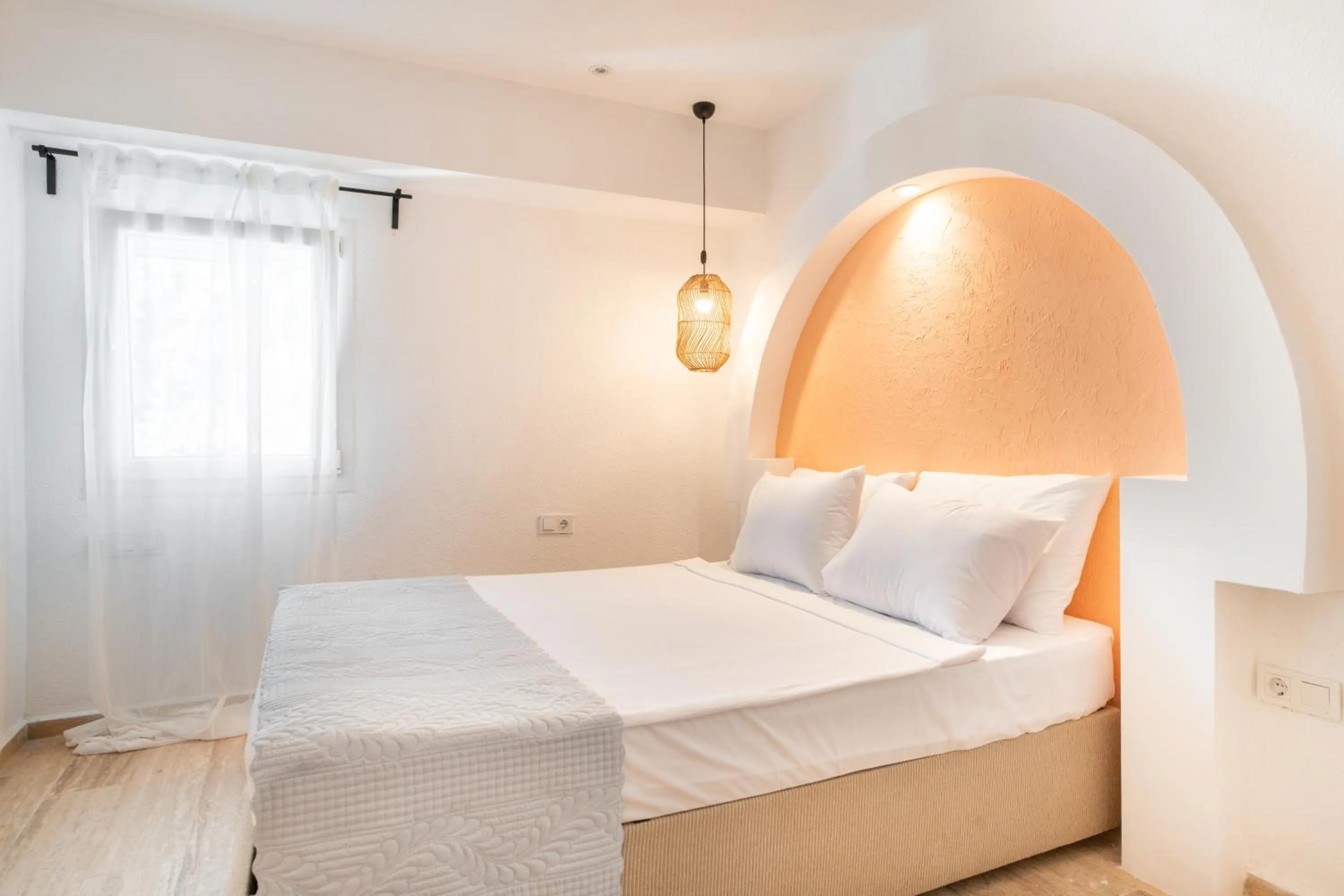 Bed in MARE MARIN BOUTIQUE HOTEL