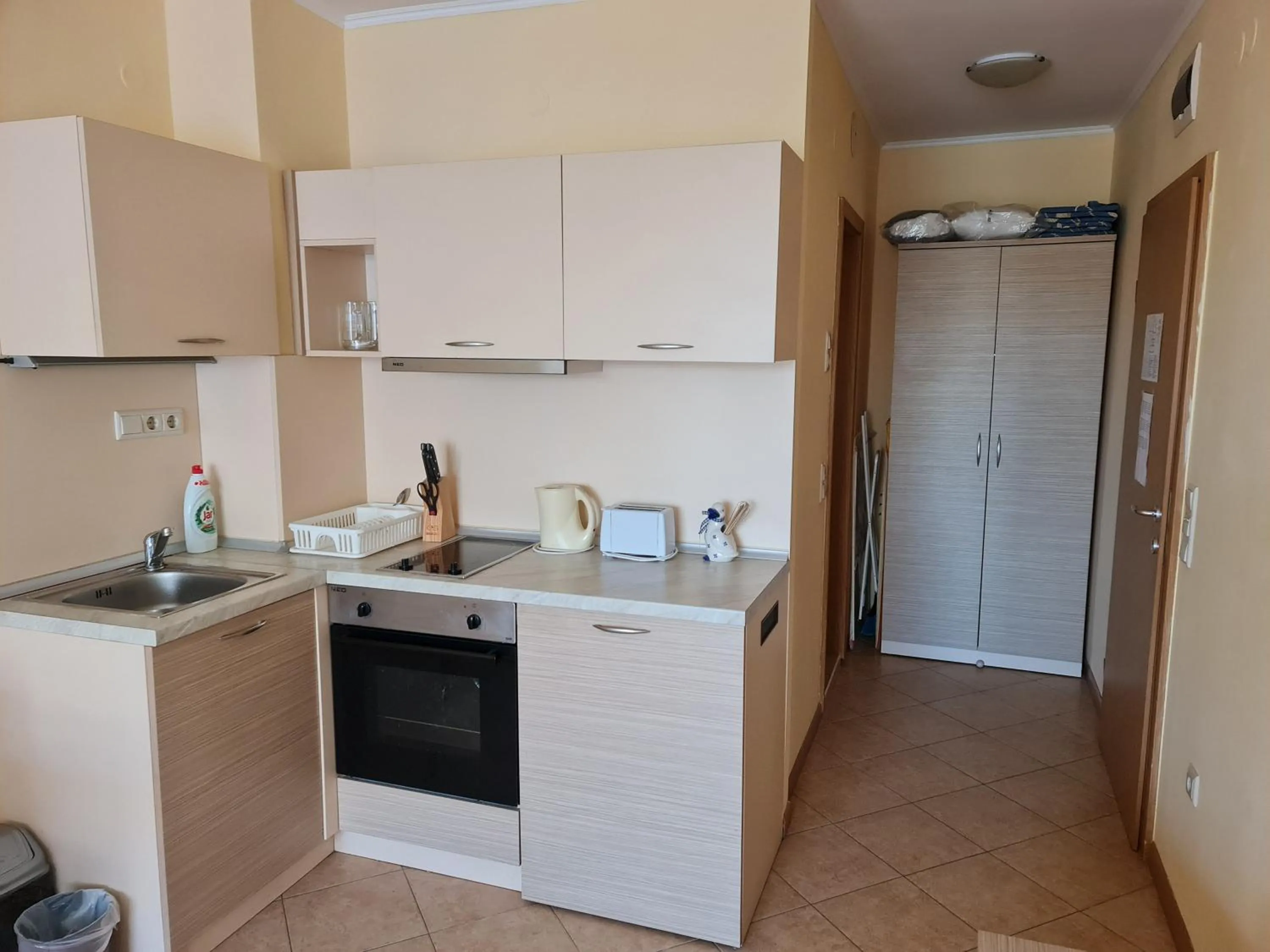 Kitchen or kitchenette in Royal Sun premium apartment