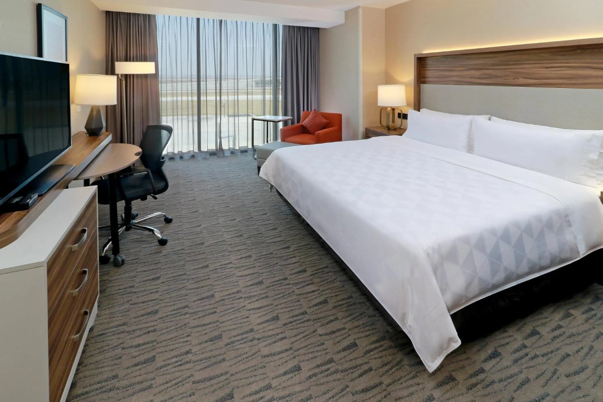 Photo of the whole room, Bed in Holiday Inn & Suites - Mexico Felipe Angeles Airport by IHG