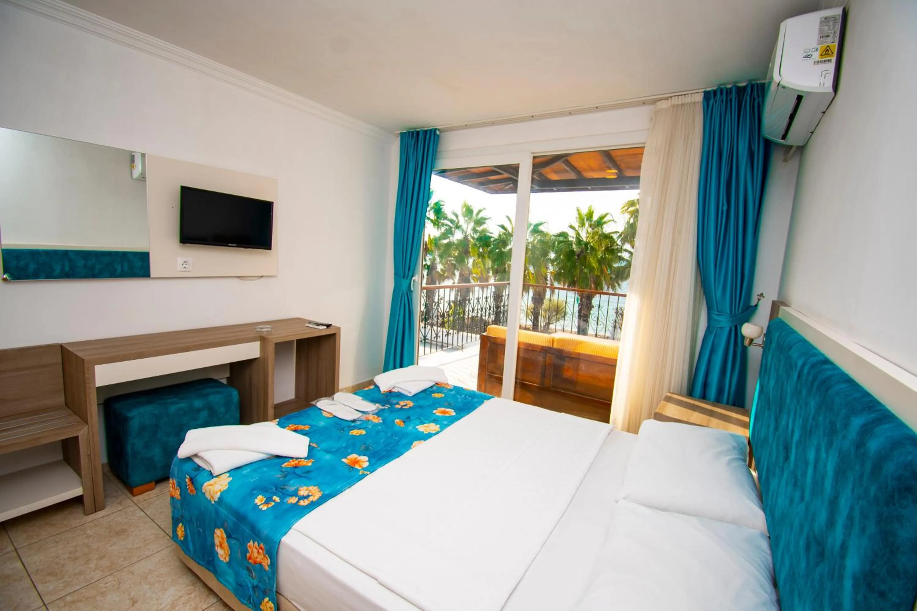 Communal lounge/ TV room, Bed in Sami Beach Hotel- All Inclusive