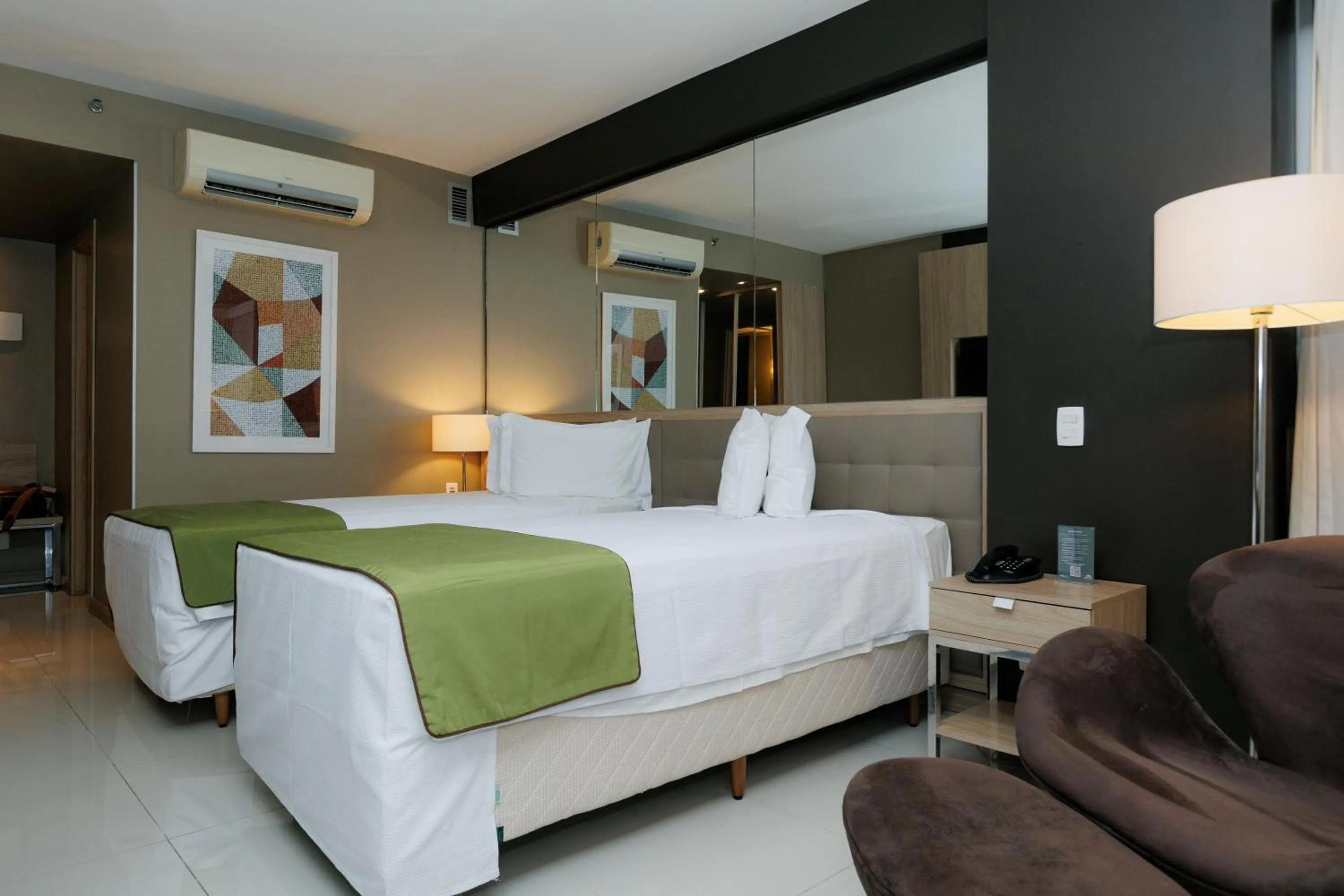 Bed in eSuites Savassi Toscanini