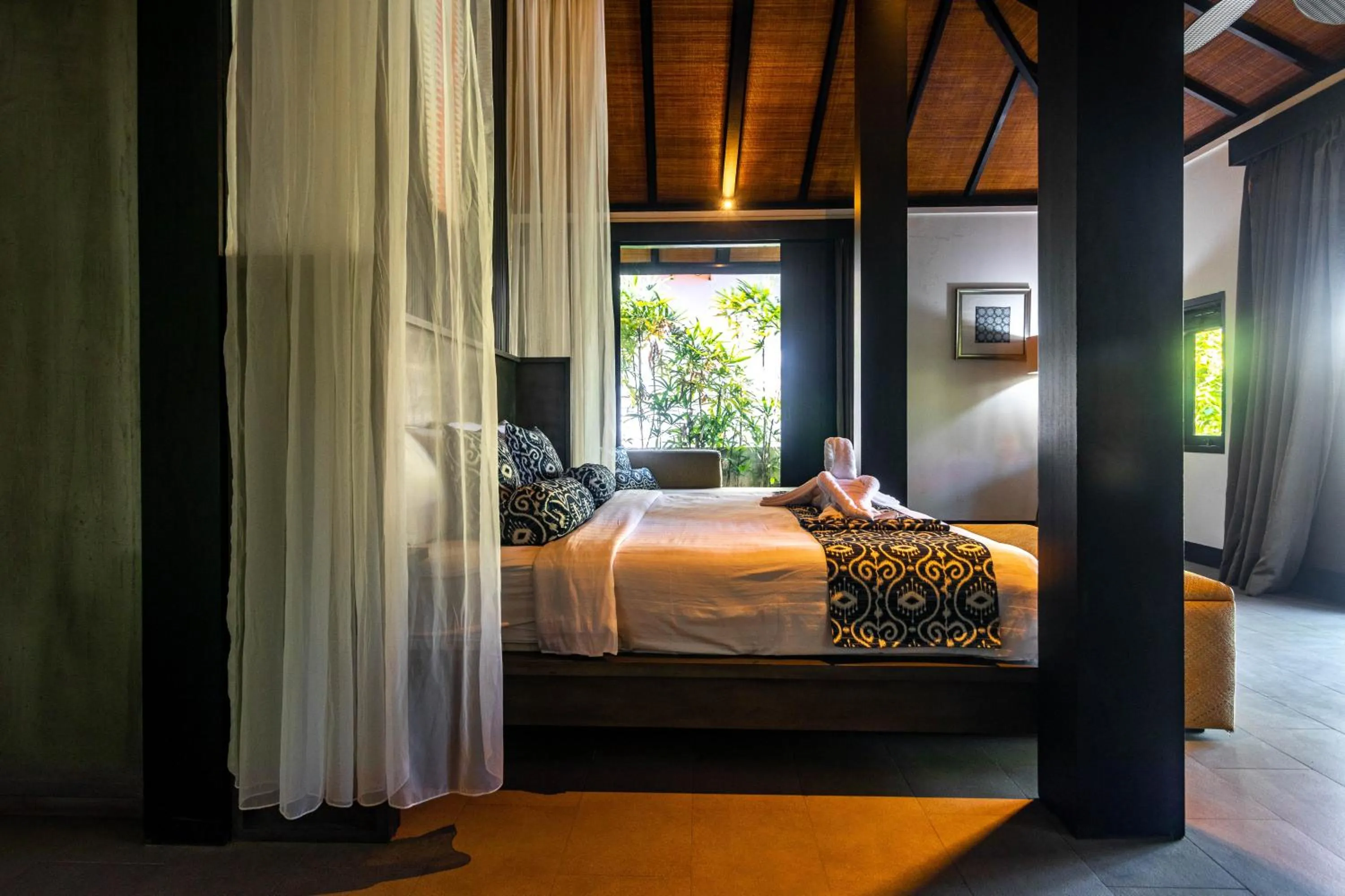 Bed in Surya Melasti Beach Villa