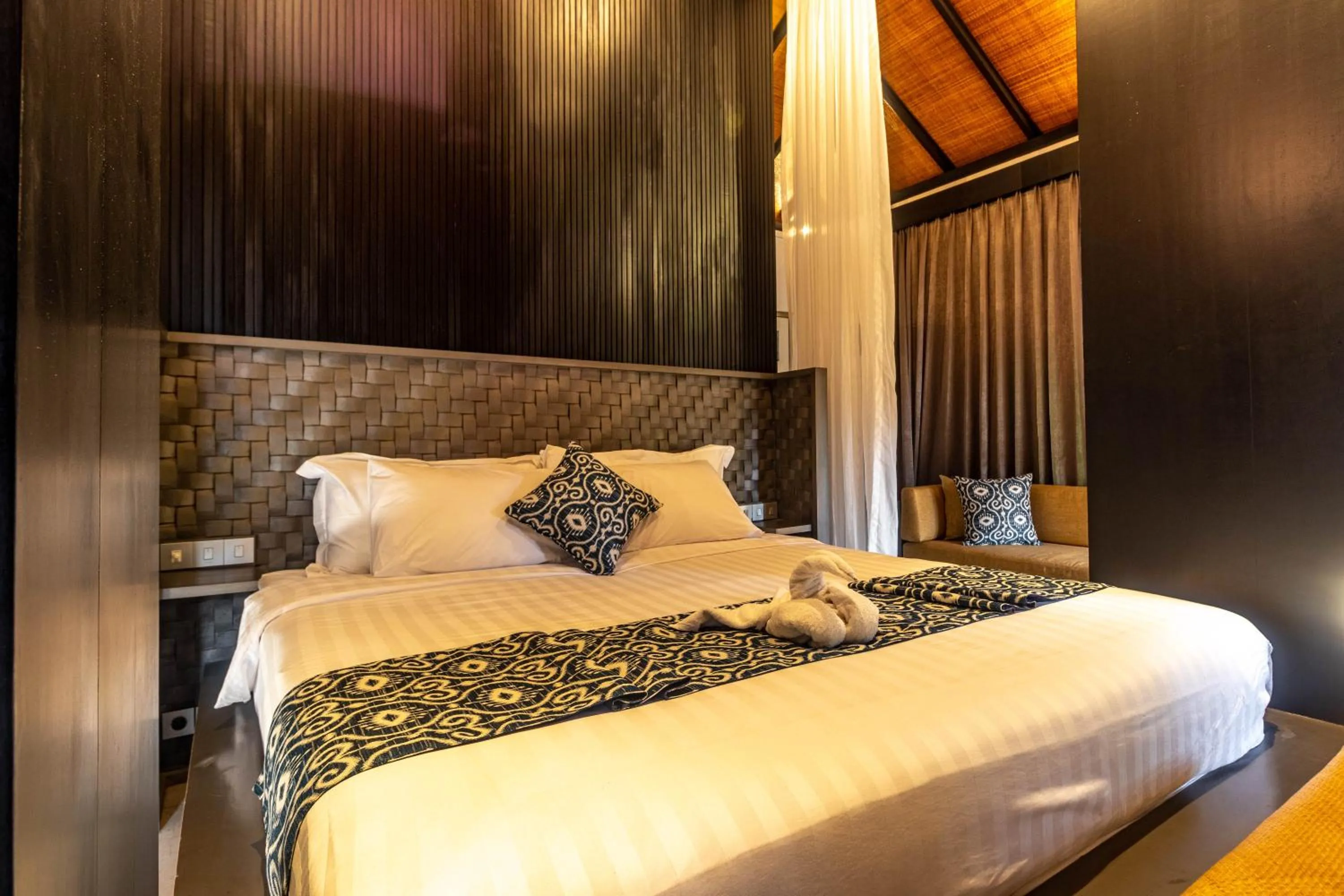 Bed in Surya Melasti Beach Villa