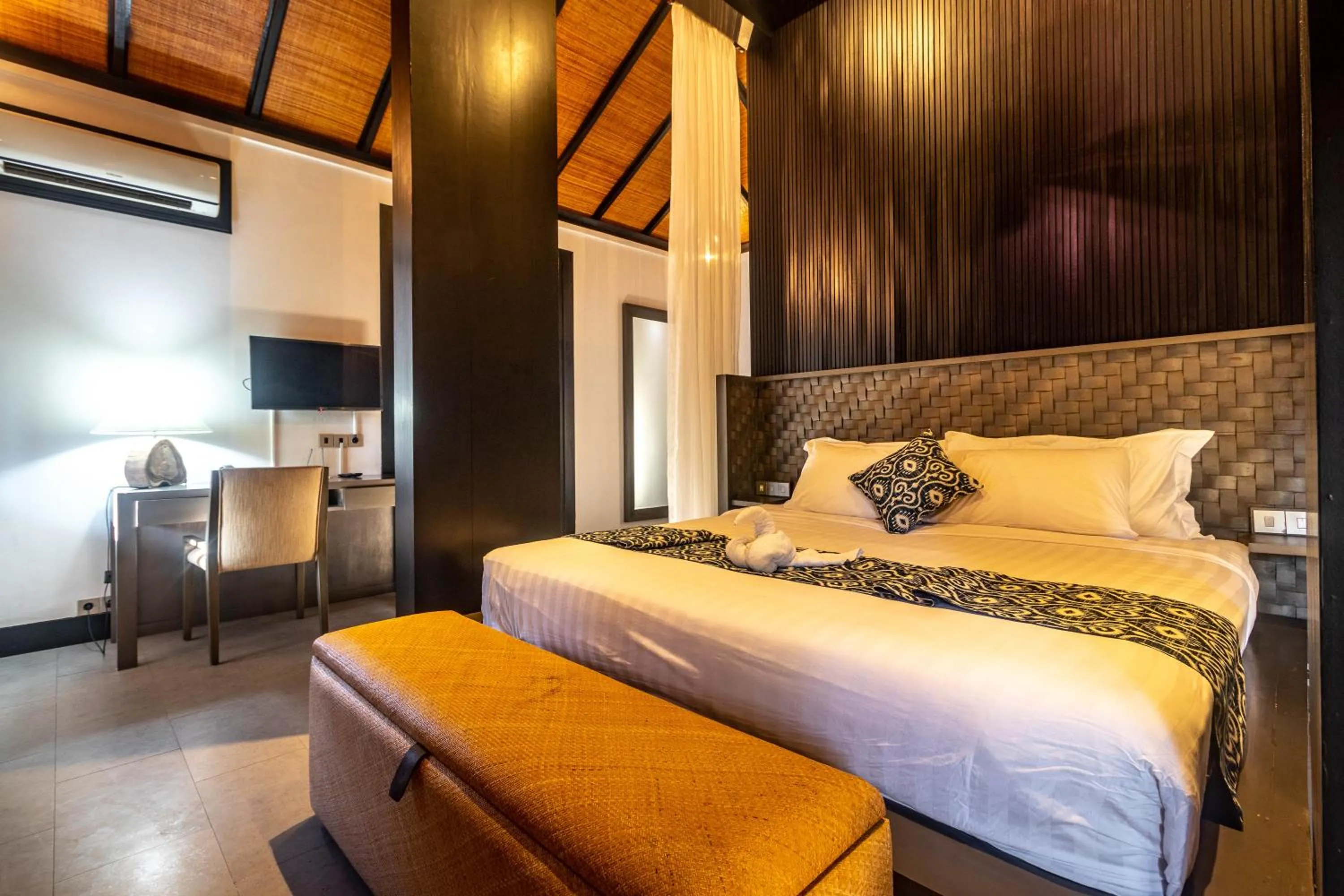 Bed in Surya Melasti Beach Villa
