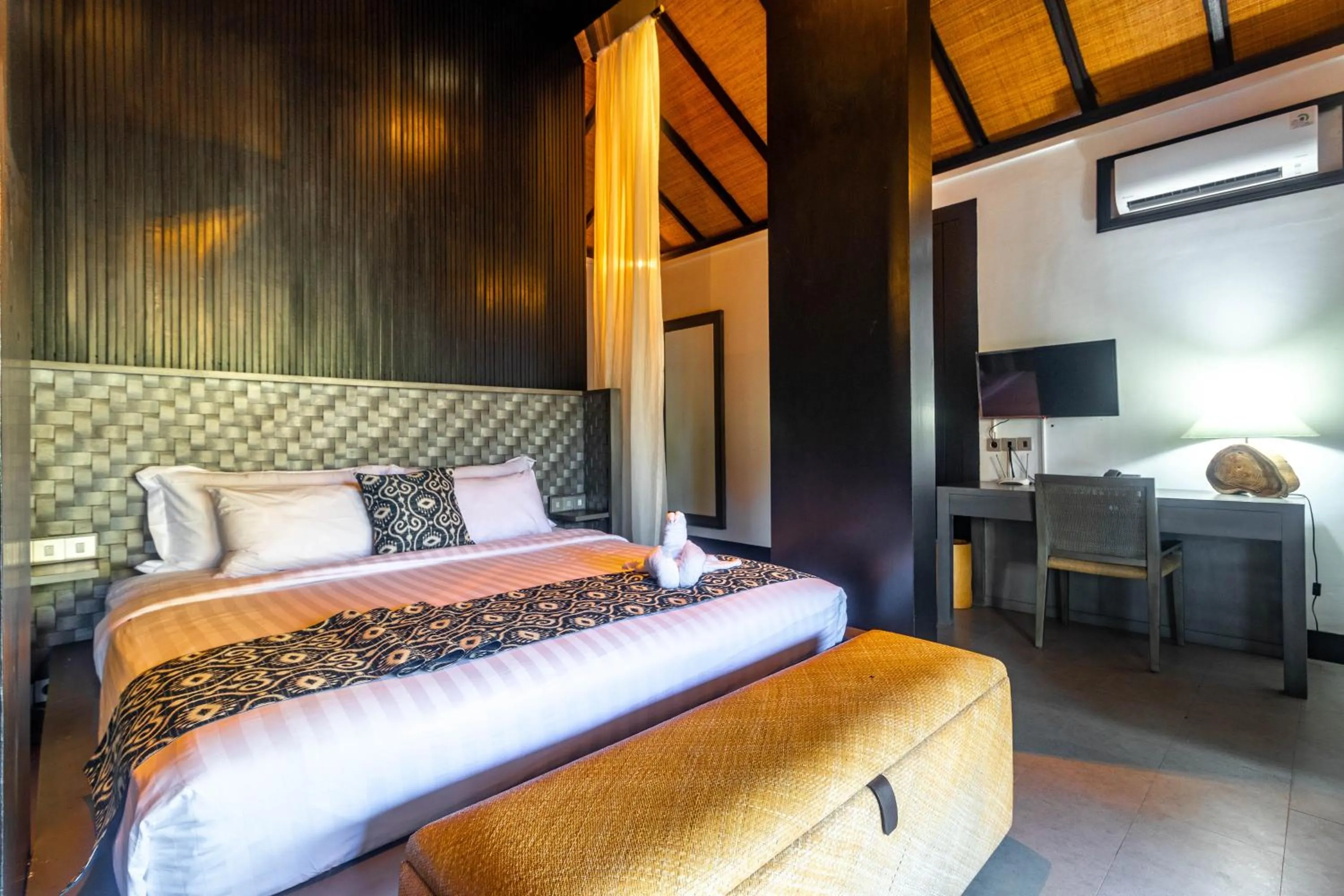 Bed in Surya Melasti Beach Villa