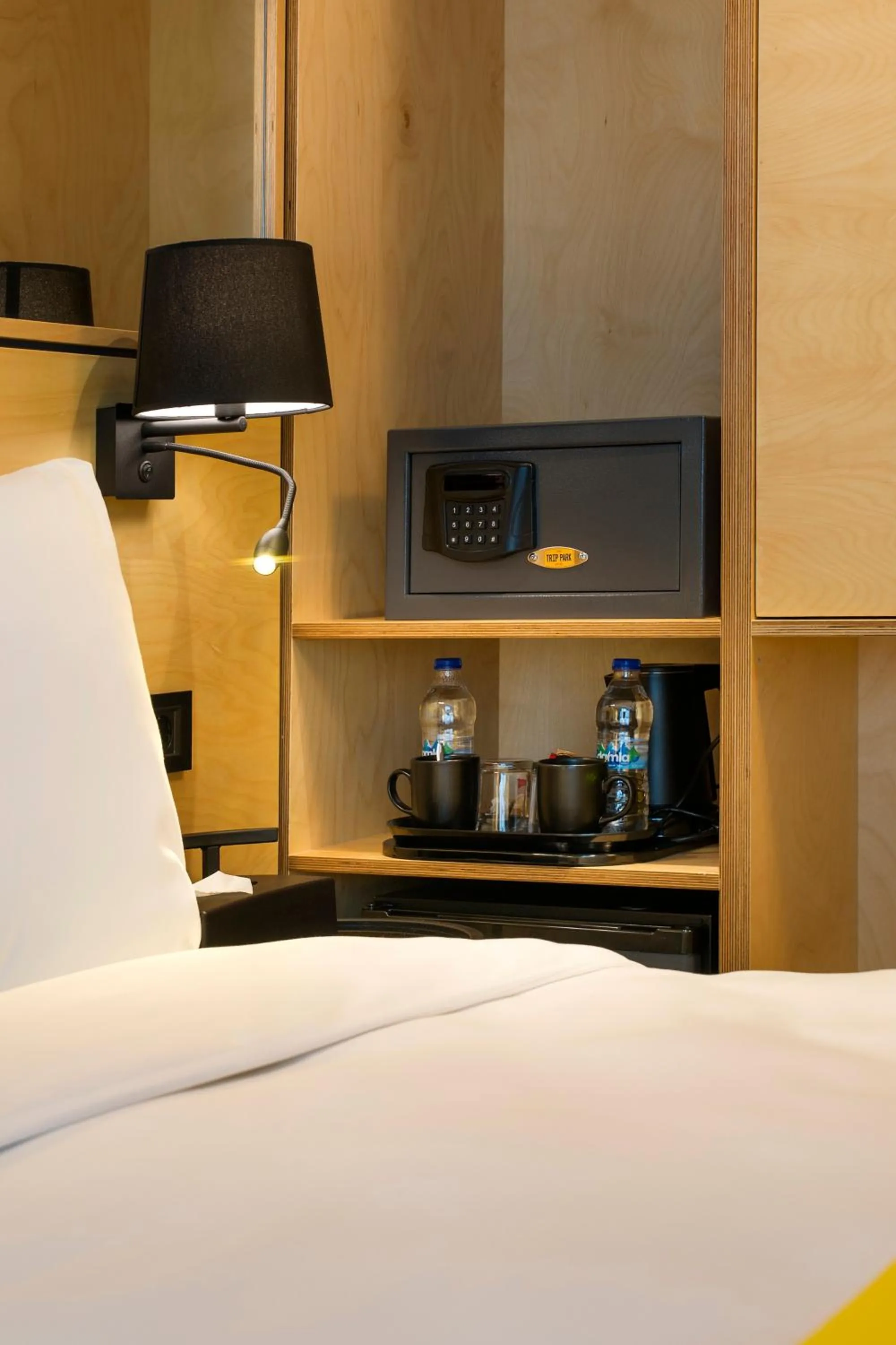 Bed in Trip Park Hotel