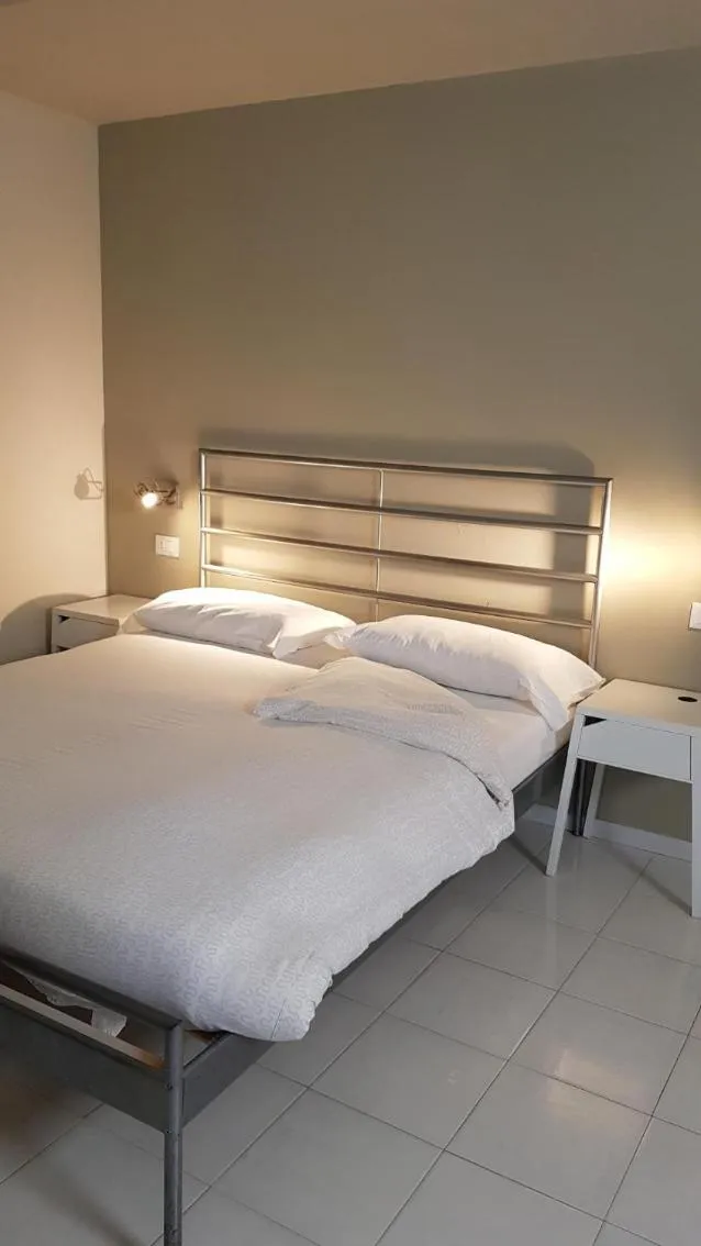 Bed in hotel garni Santa Caterina