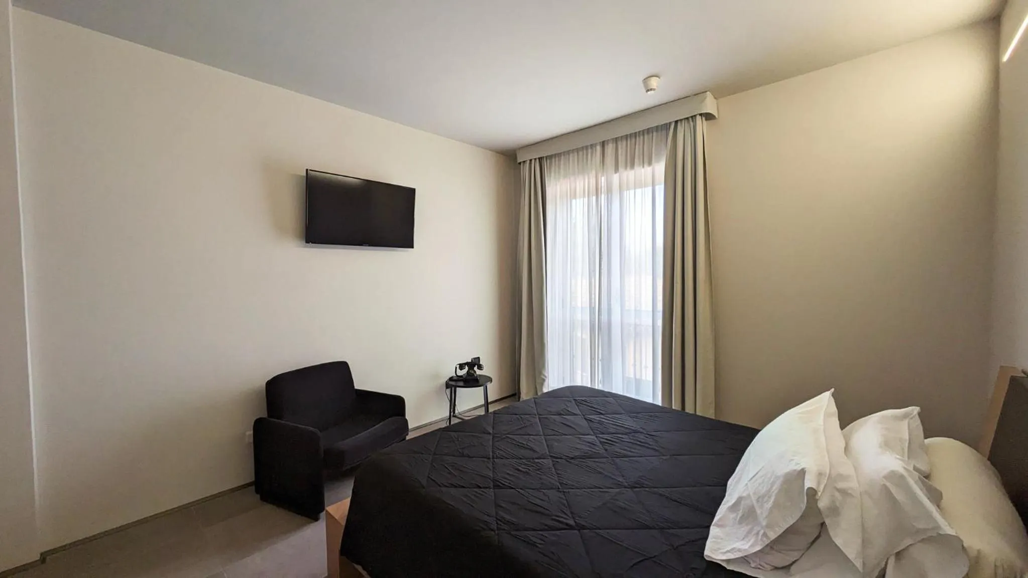 TV and multimedia, Bed in hotel garni Santa Caterina