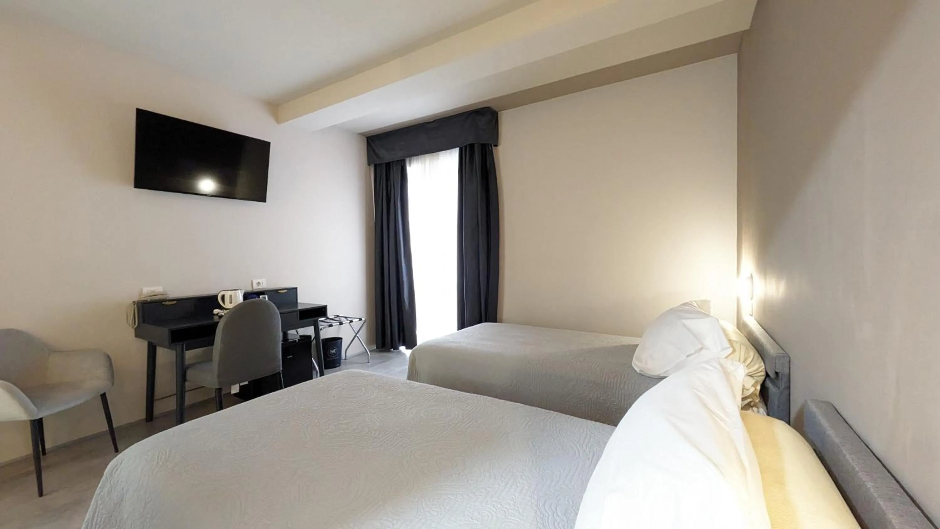 Bed in hotel garni Santa Caterina