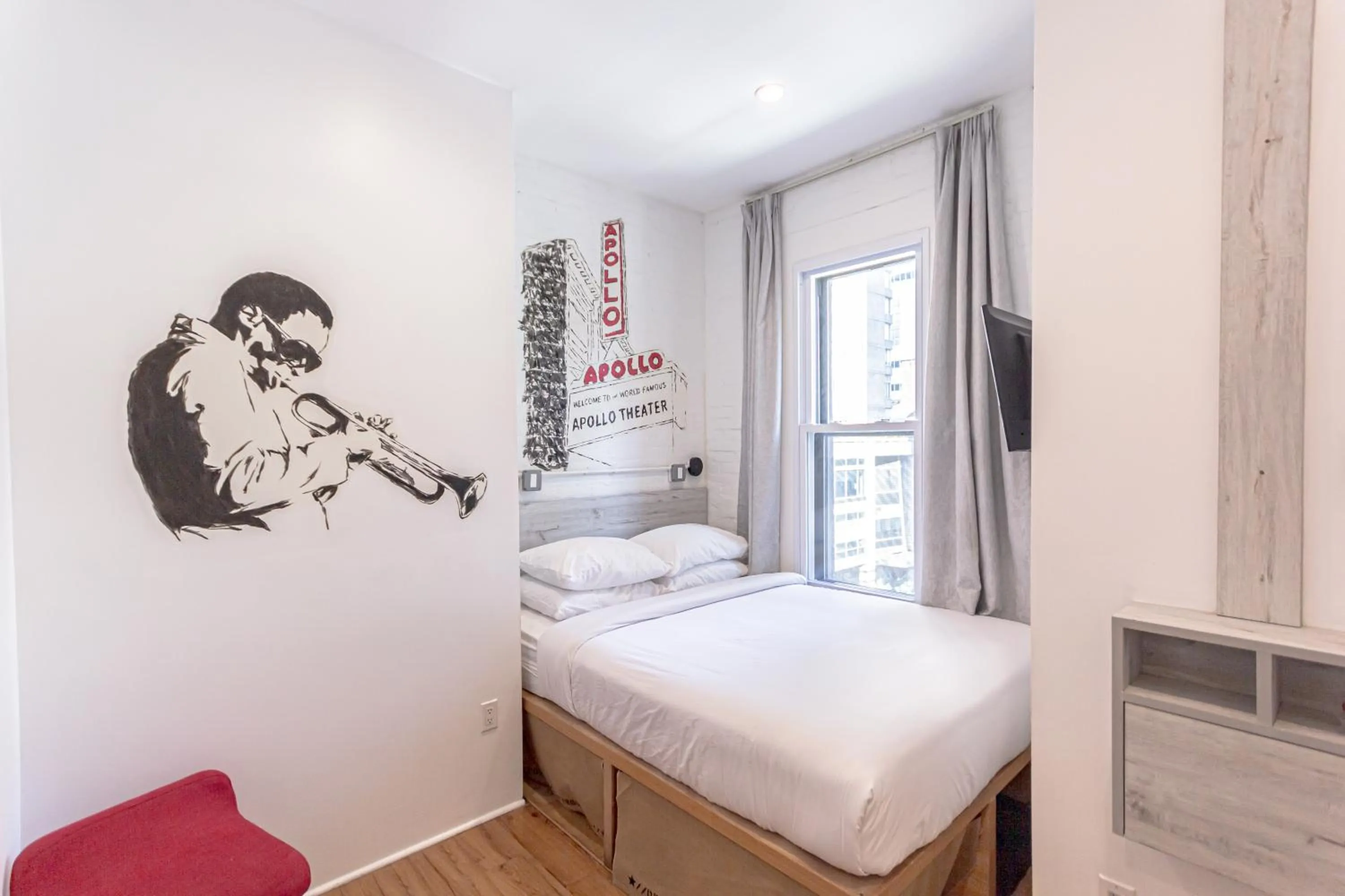 Bed in JG Times SQ Hotel by JGSTAY