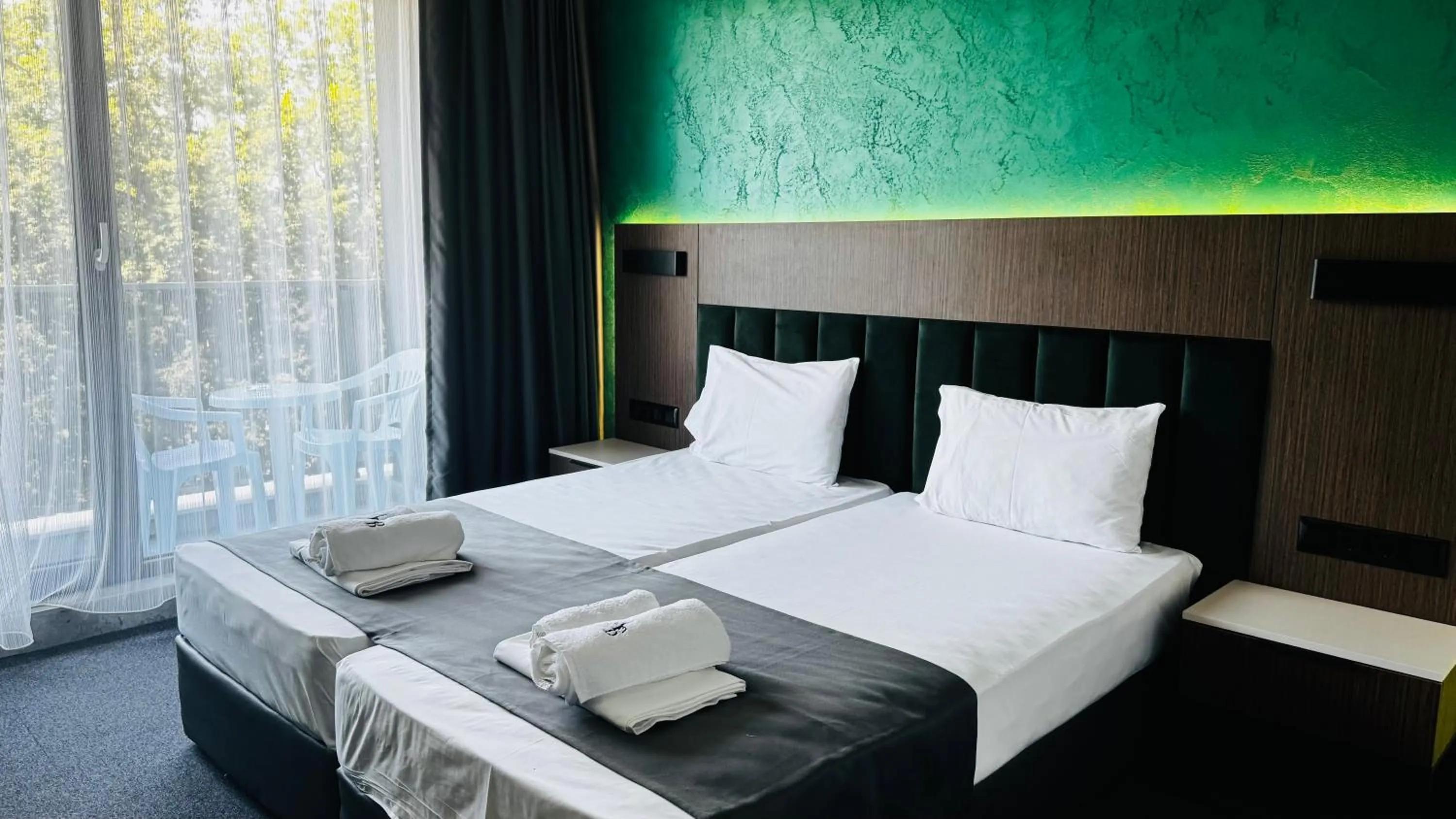 Bed in Atliman Beach Park Hotel