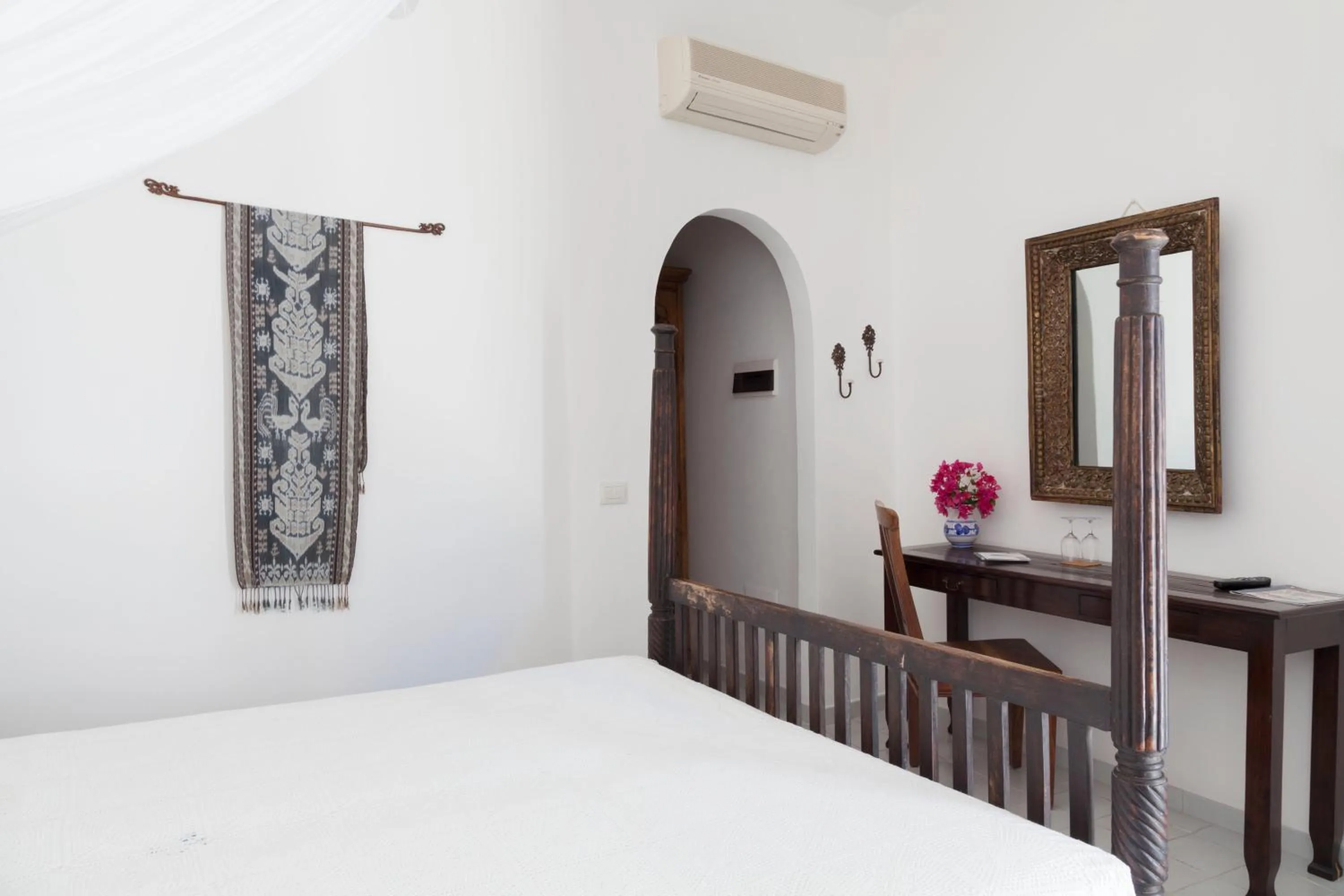Bed in Quartara Boutique Hotel