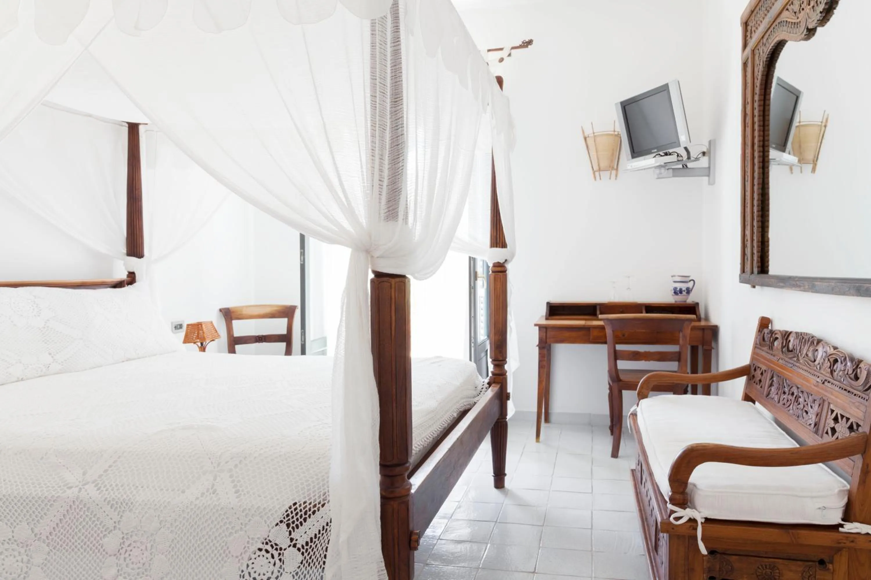 Bed in Quartara Boutique Hotel