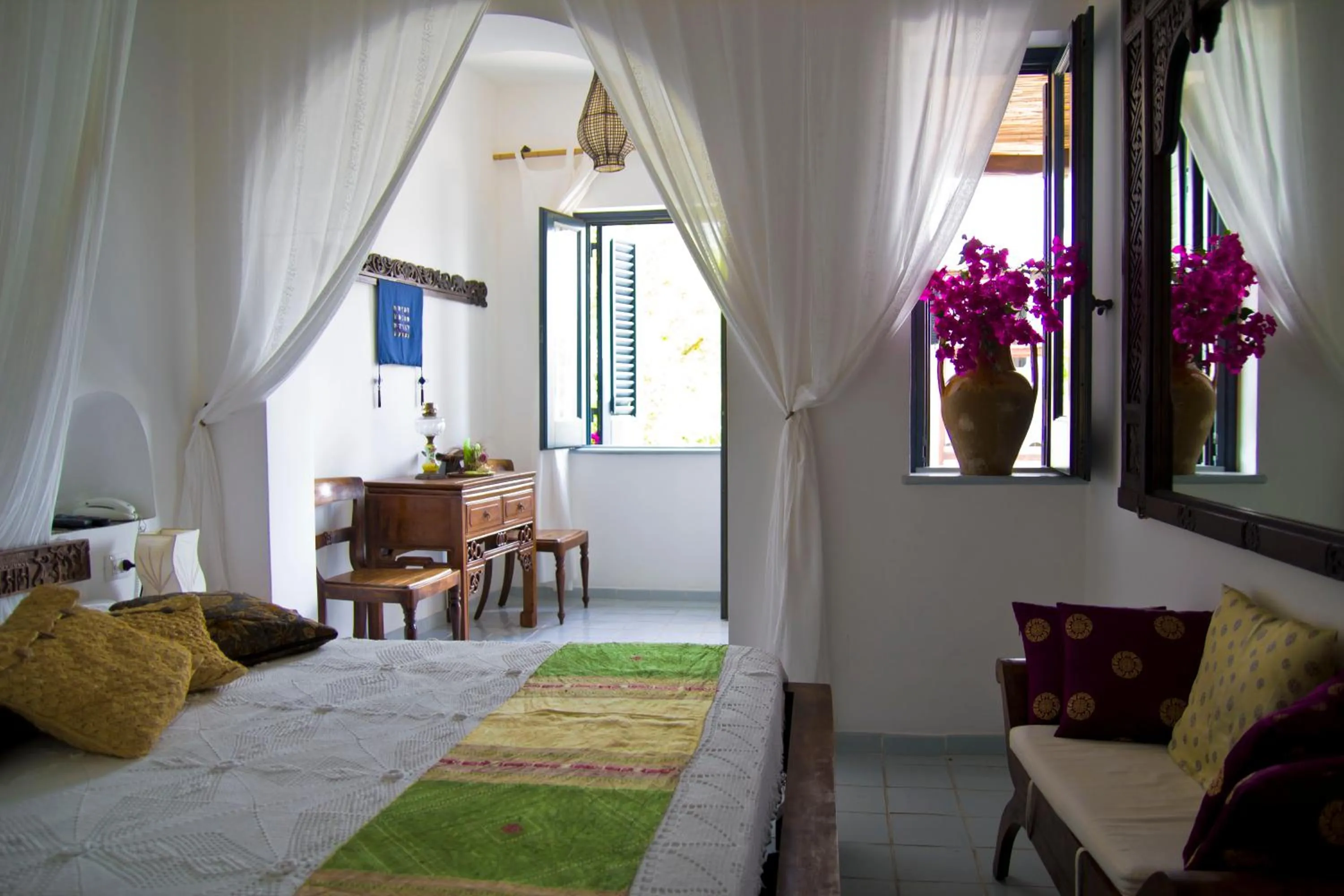 Bed in Quartara Boutique Hotel