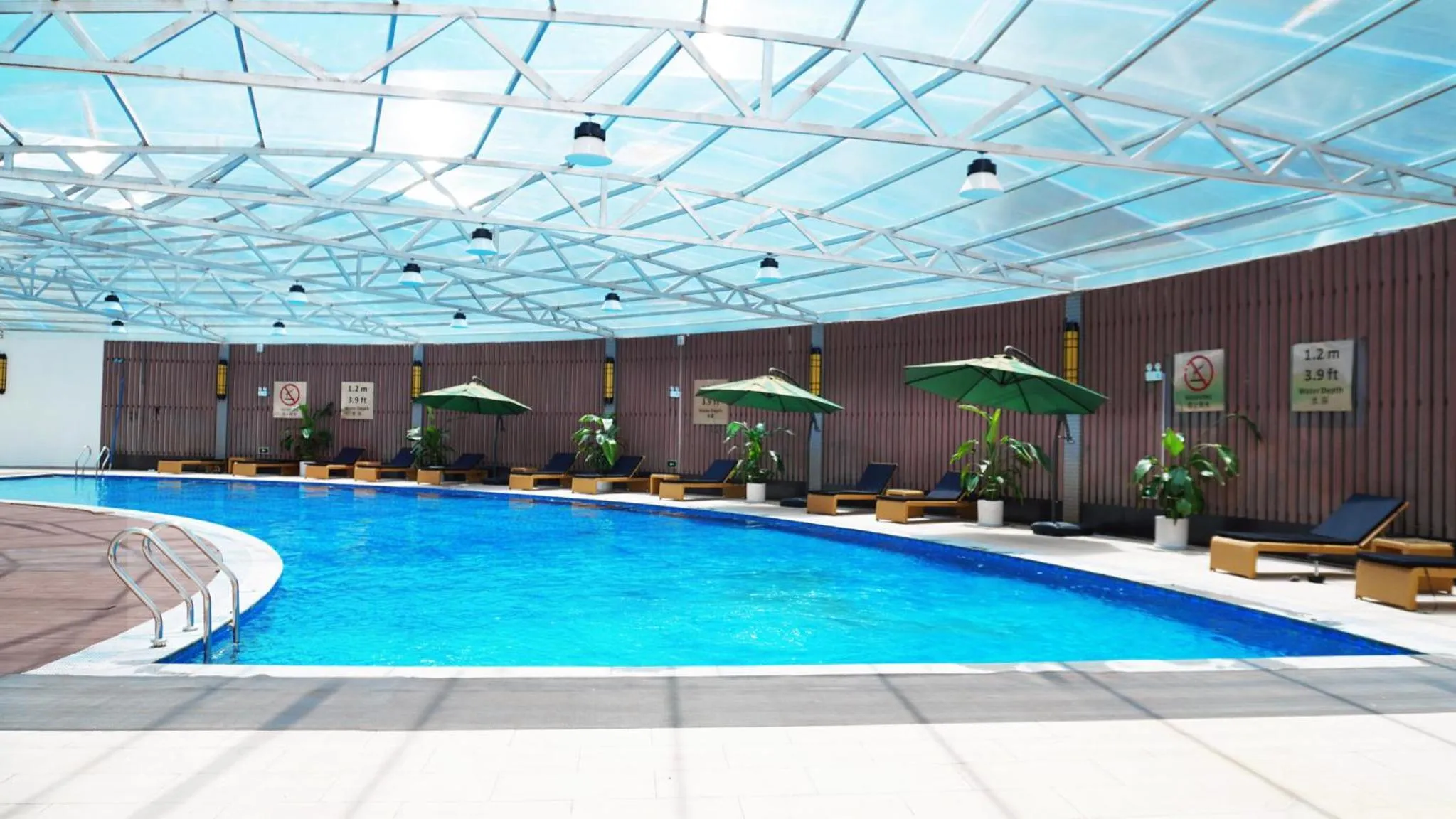 Swimming pool in Crowne Plaza Kunming City Centre by IHG