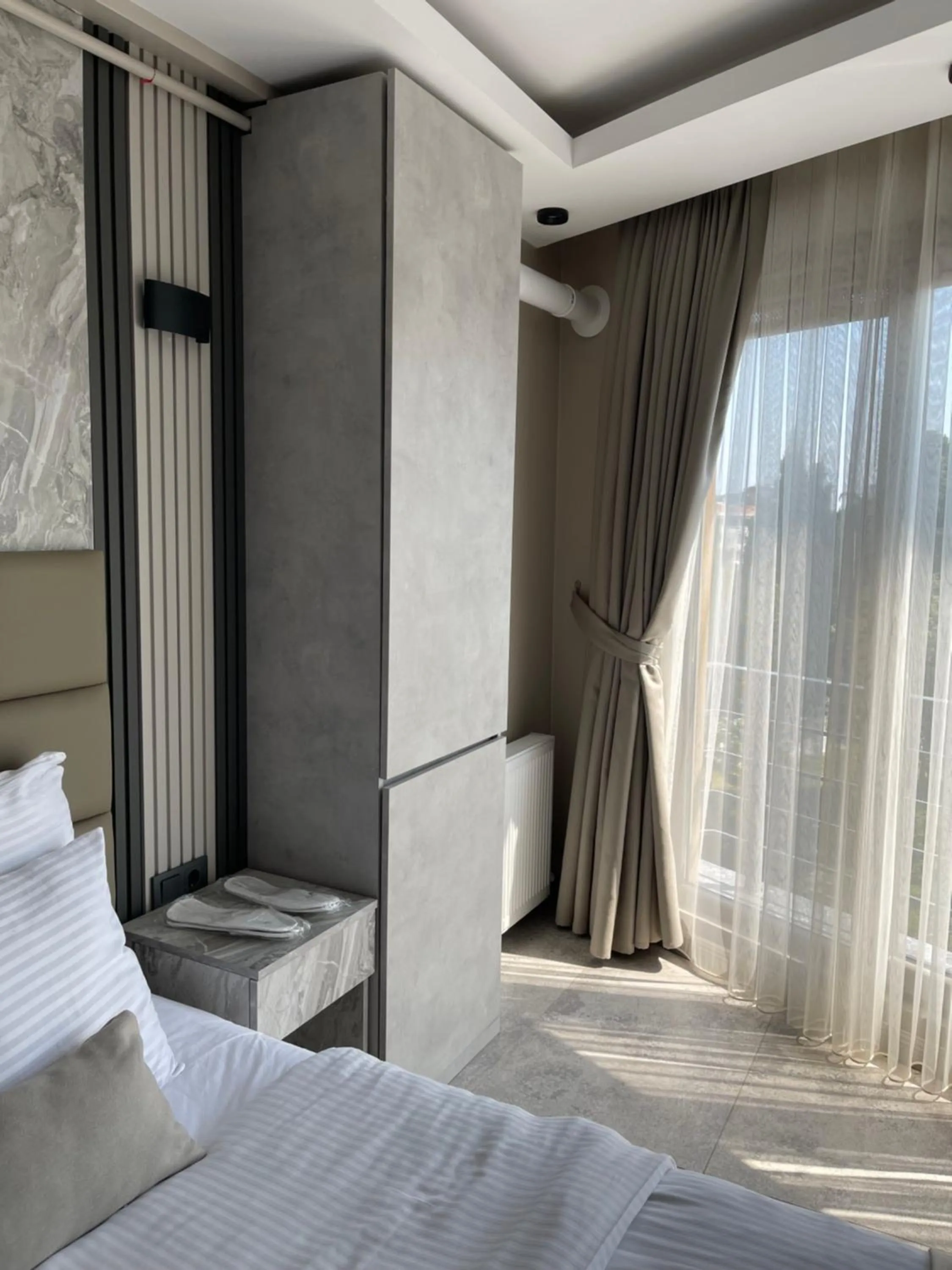 Bed in Aymira Suite Hotel